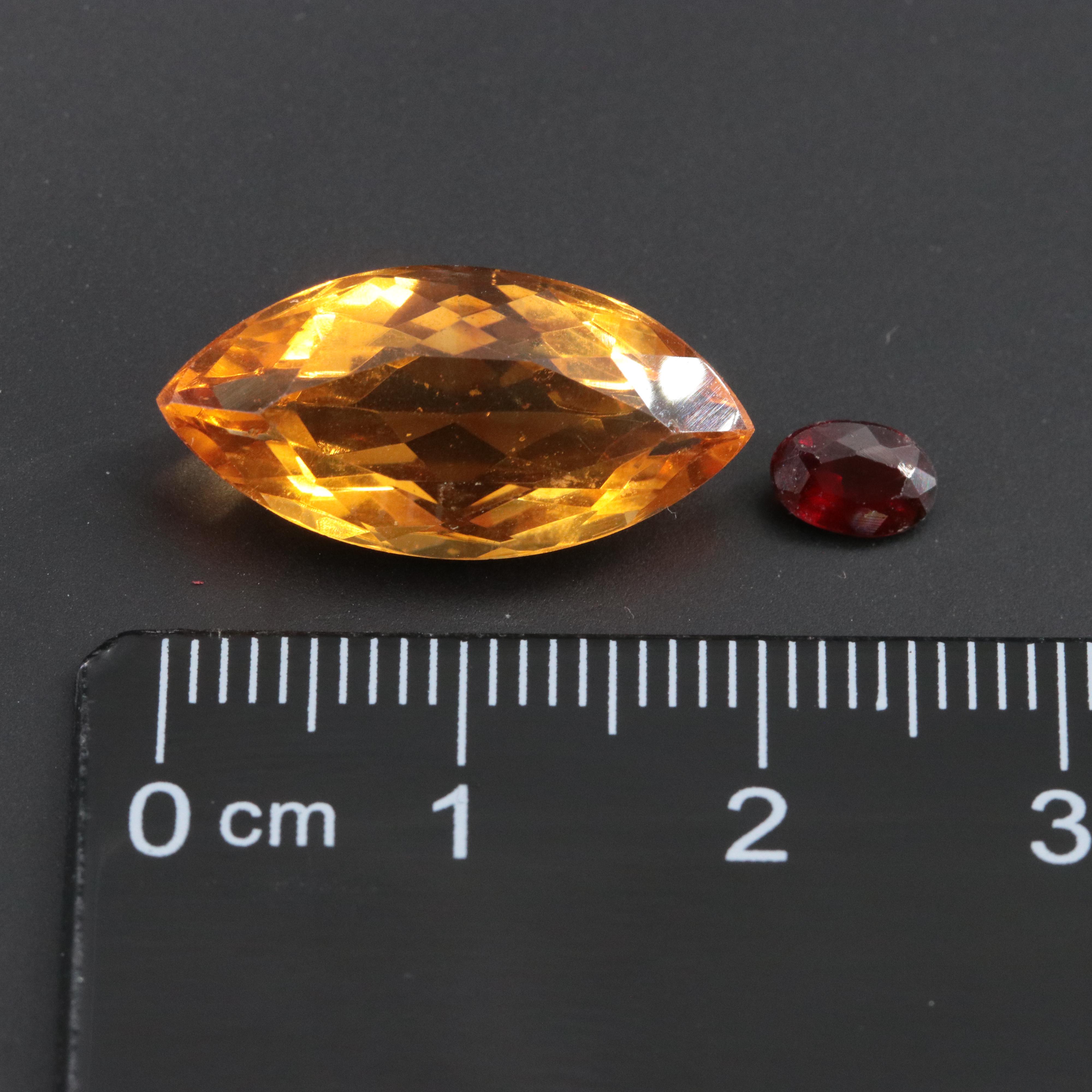 Loose 37.89 CTW Gemstone Lot Including Amethyst, Smoky Quartz and Garnet