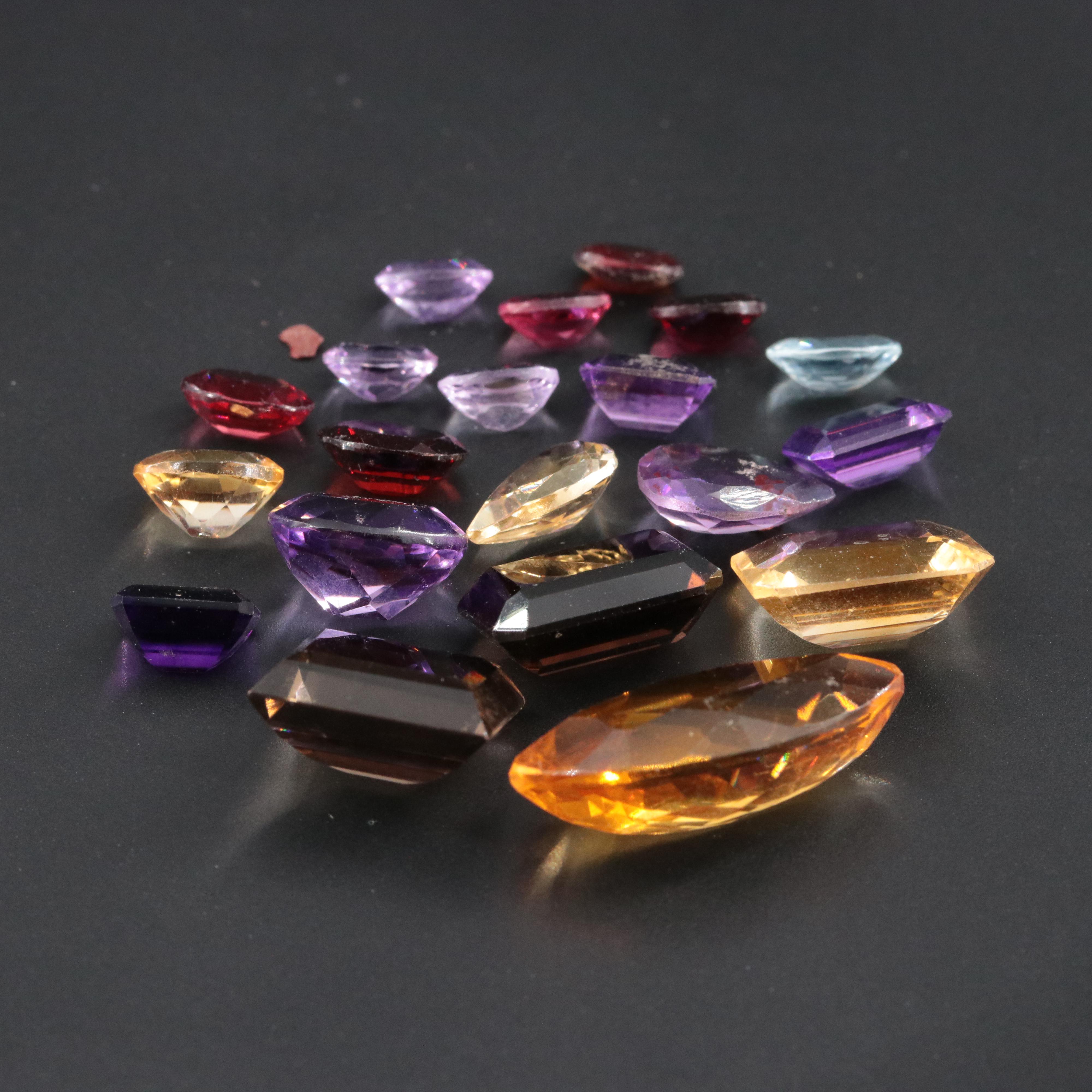 Loose 37.89 CTW Gemstone Lot Including Amethyst, Smoky Quartz and Garnet