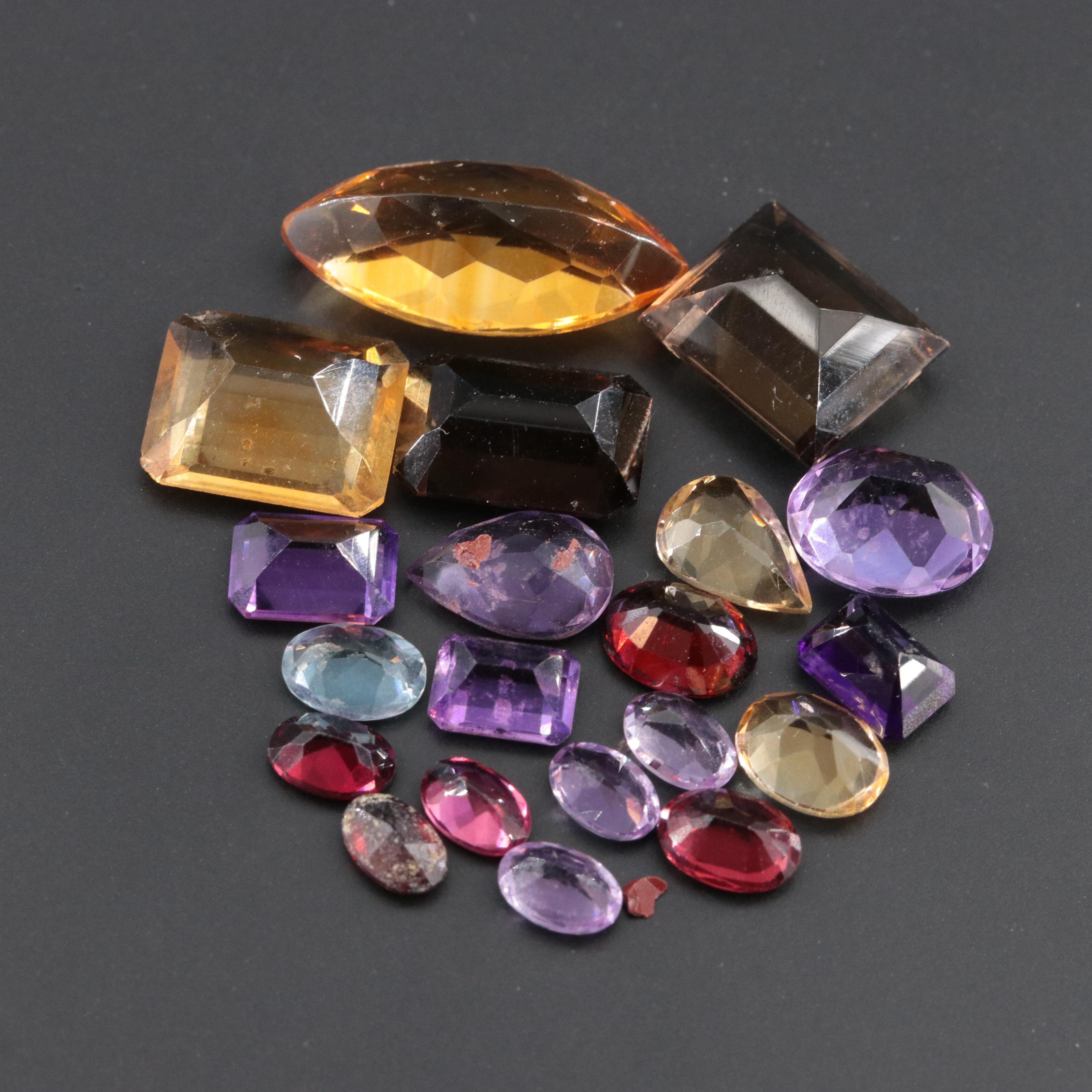 Loose 37.89 CTW Gemstone Lot Including Amethyst, Smoky Quartz and Garnet