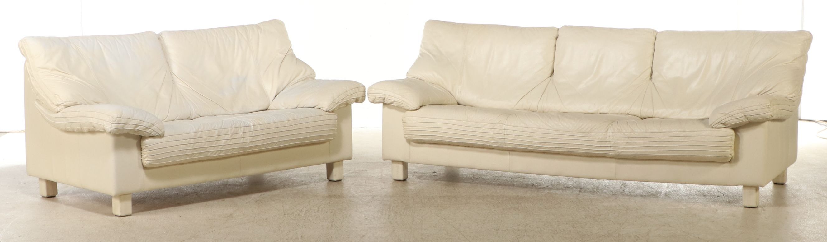 Italian Modernist Style Cream Leather Upholstered Sofa and Loveseat