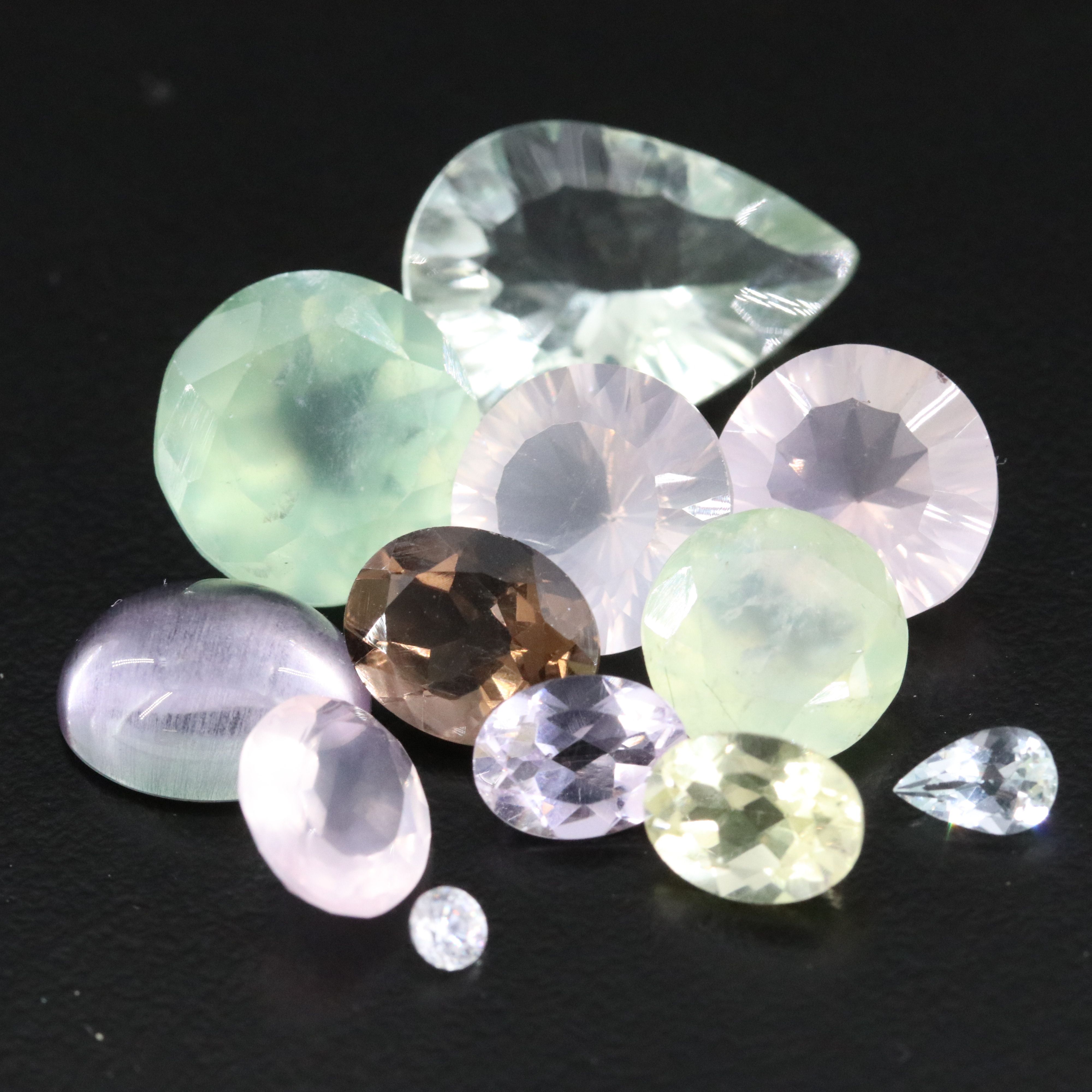 Loose 38.07 CTW Mixed Gemstone Lot with Rose Quartz, Prasiolite and Smoky Quartz