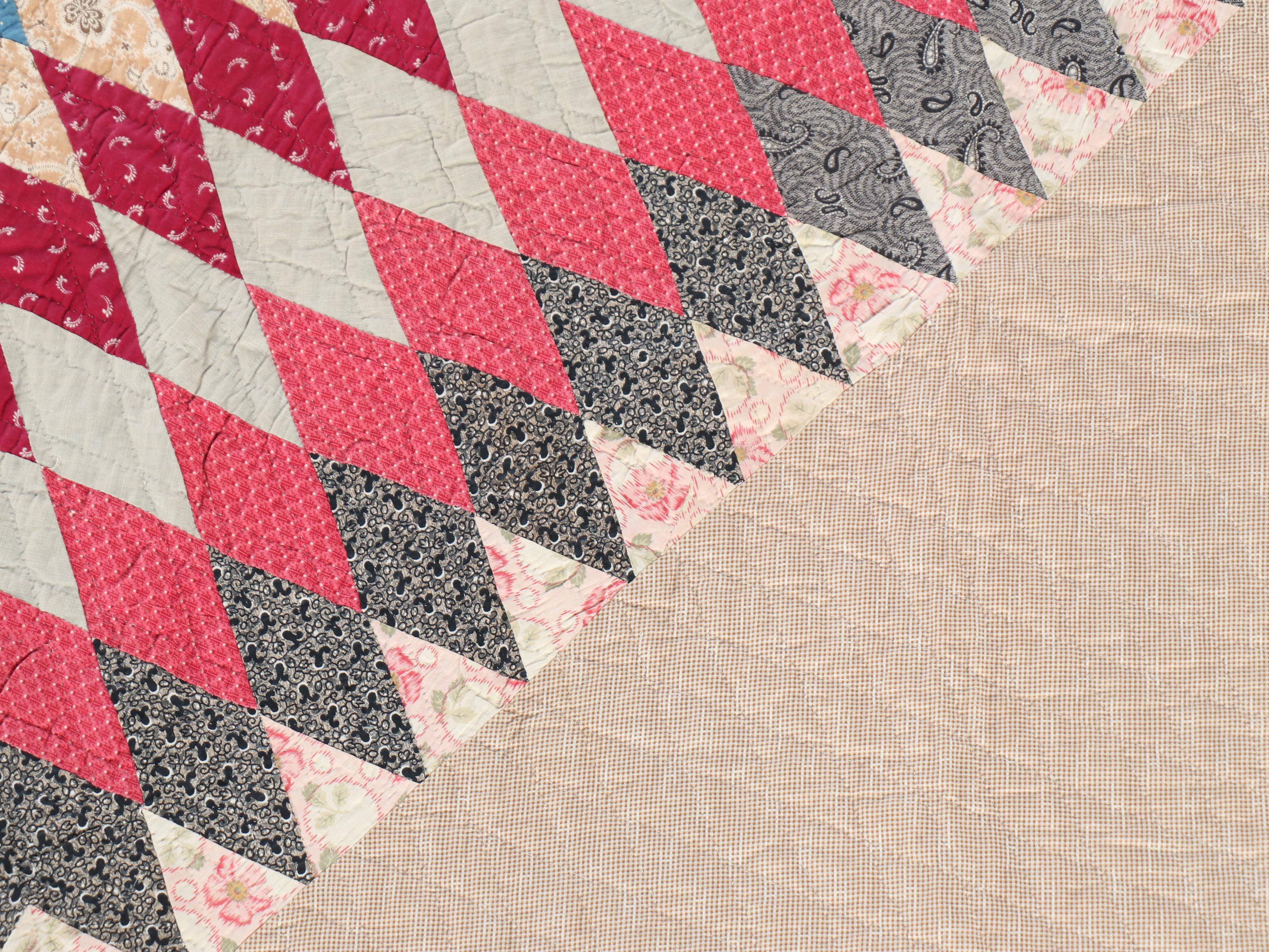 Hand-Pieced "Bursting Star" Antique Calico Quilt, 1911