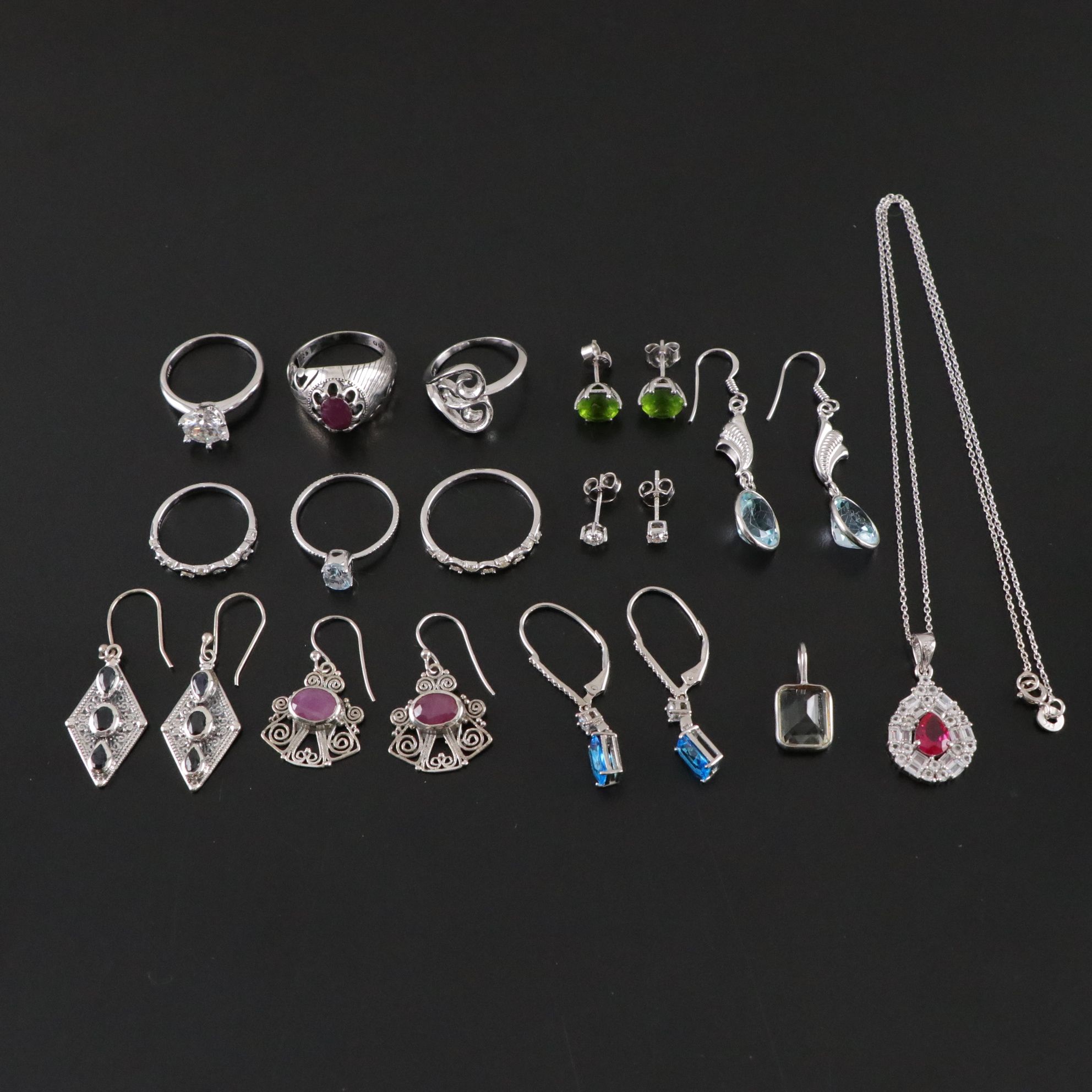 14 Assorted Sterling Silver Rings, Earring Sets, Necklaces, and a Pendant