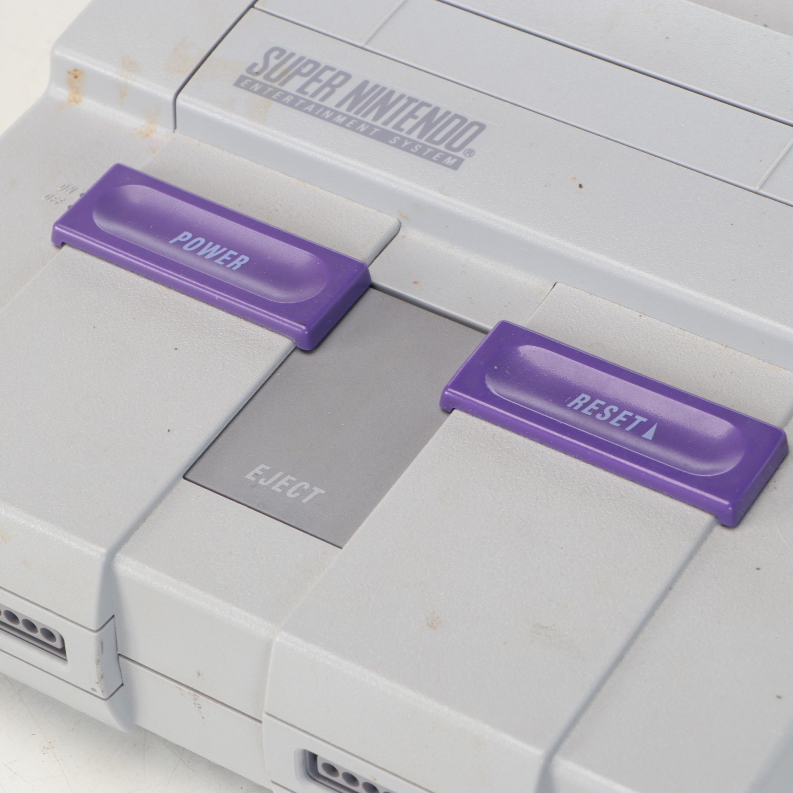 Nintendo Super NES Video Game Console with Accessories and Games, Late 20th C.