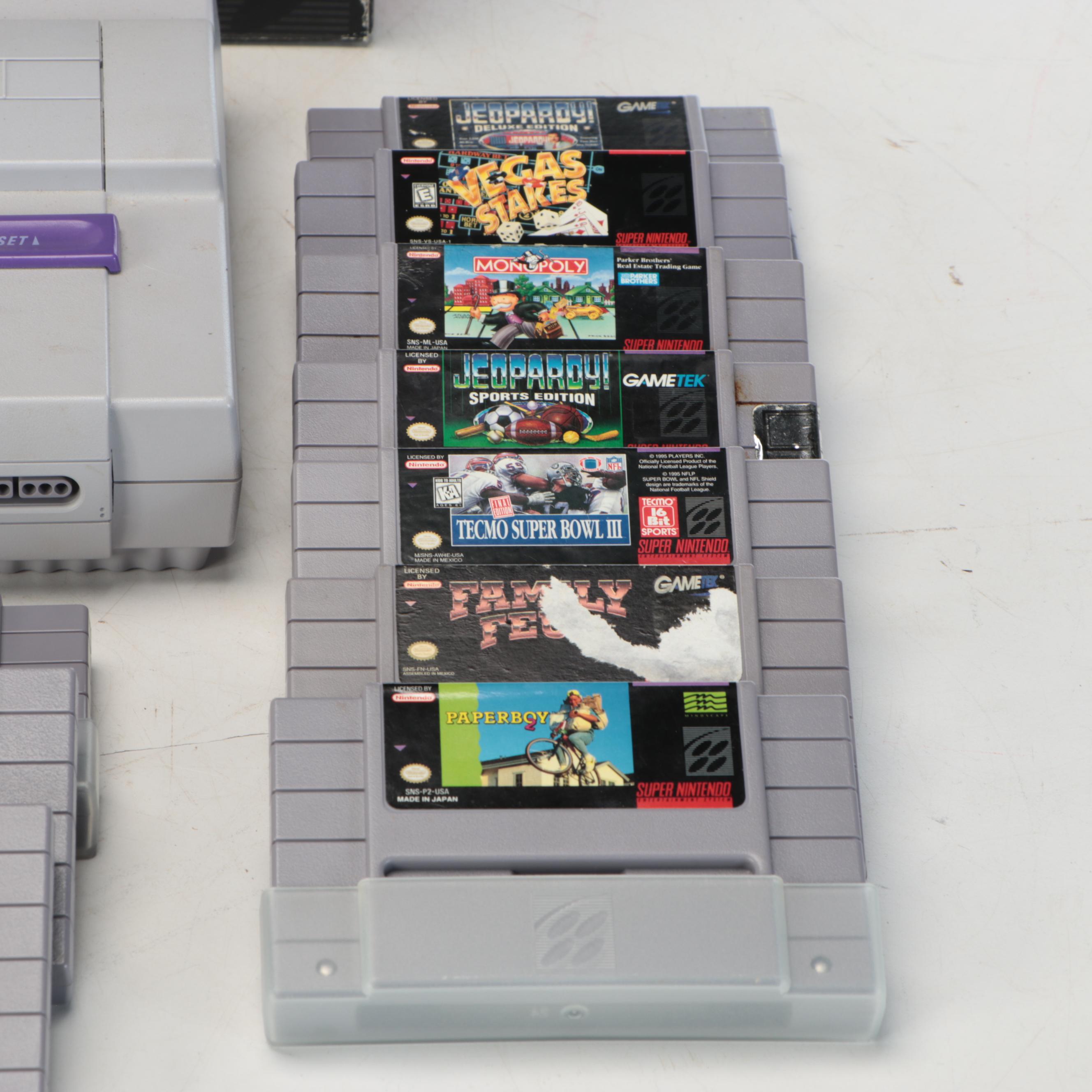 Nintendo Super NES Video Game Console with Accessories and Games, Late 20th C.