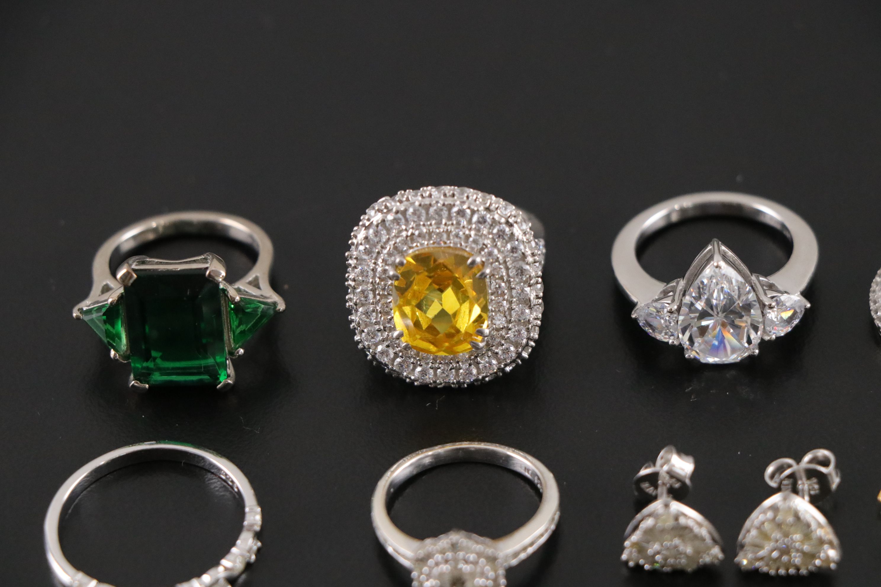 14 Assorted Sterling Silver Rings, Earrings Sets, and a Necklace