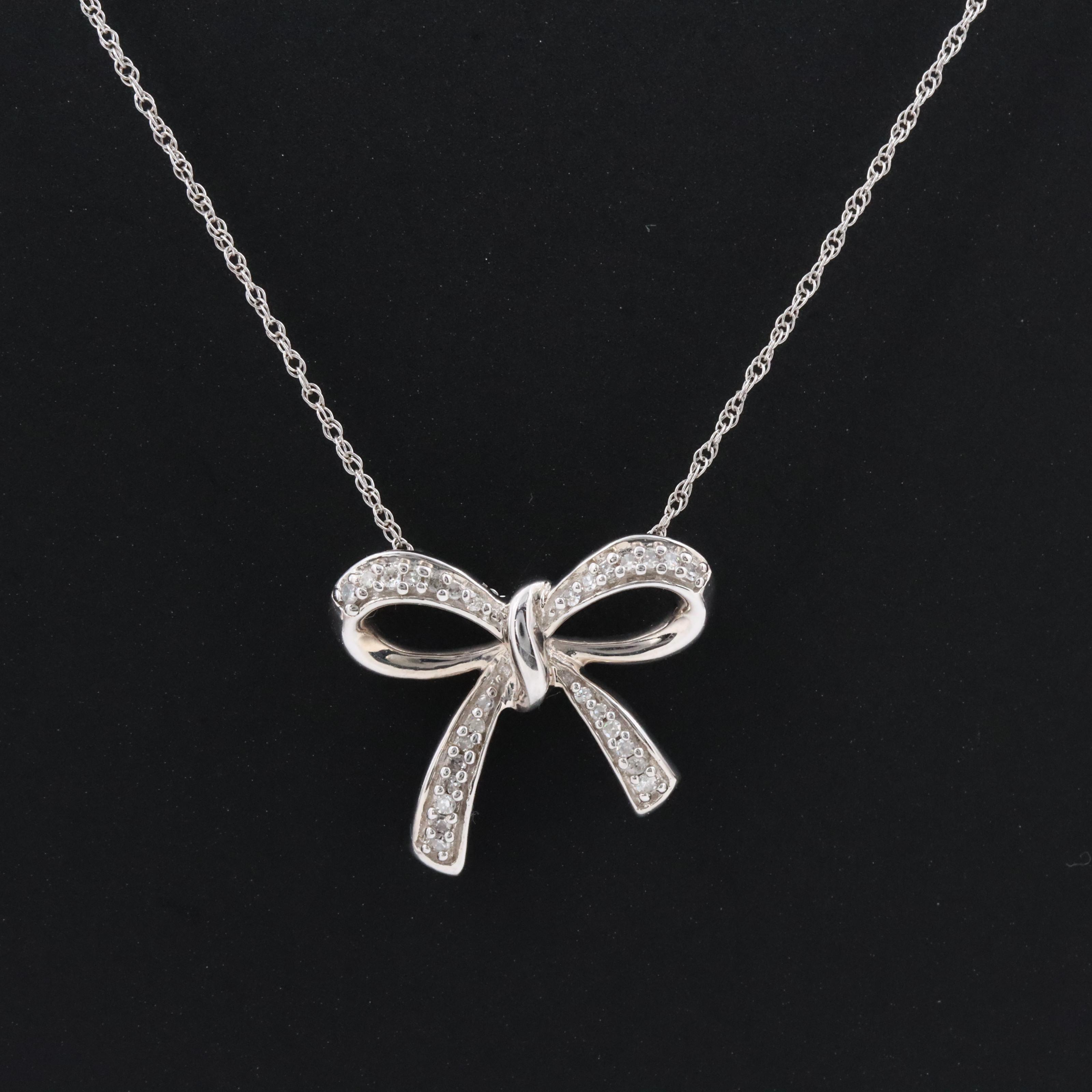 10K 0.10 CTW Diamond Bow Pendant Necklace