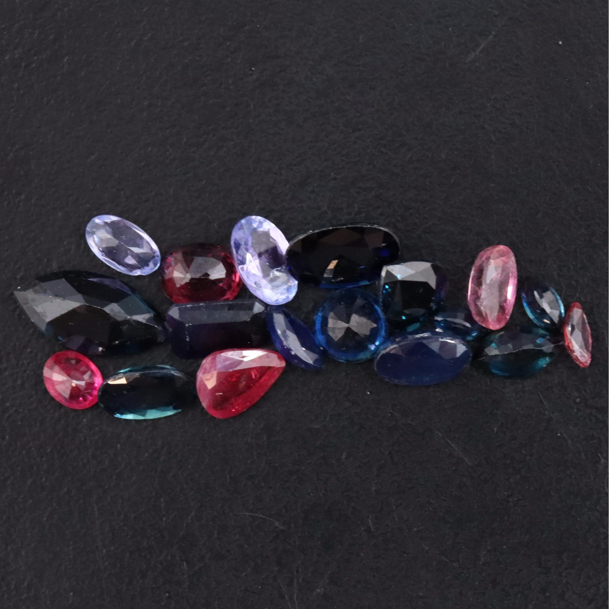 Loose 8.58 CTW Gemstones Featuring Sapphire, Ruby and Tanzanite