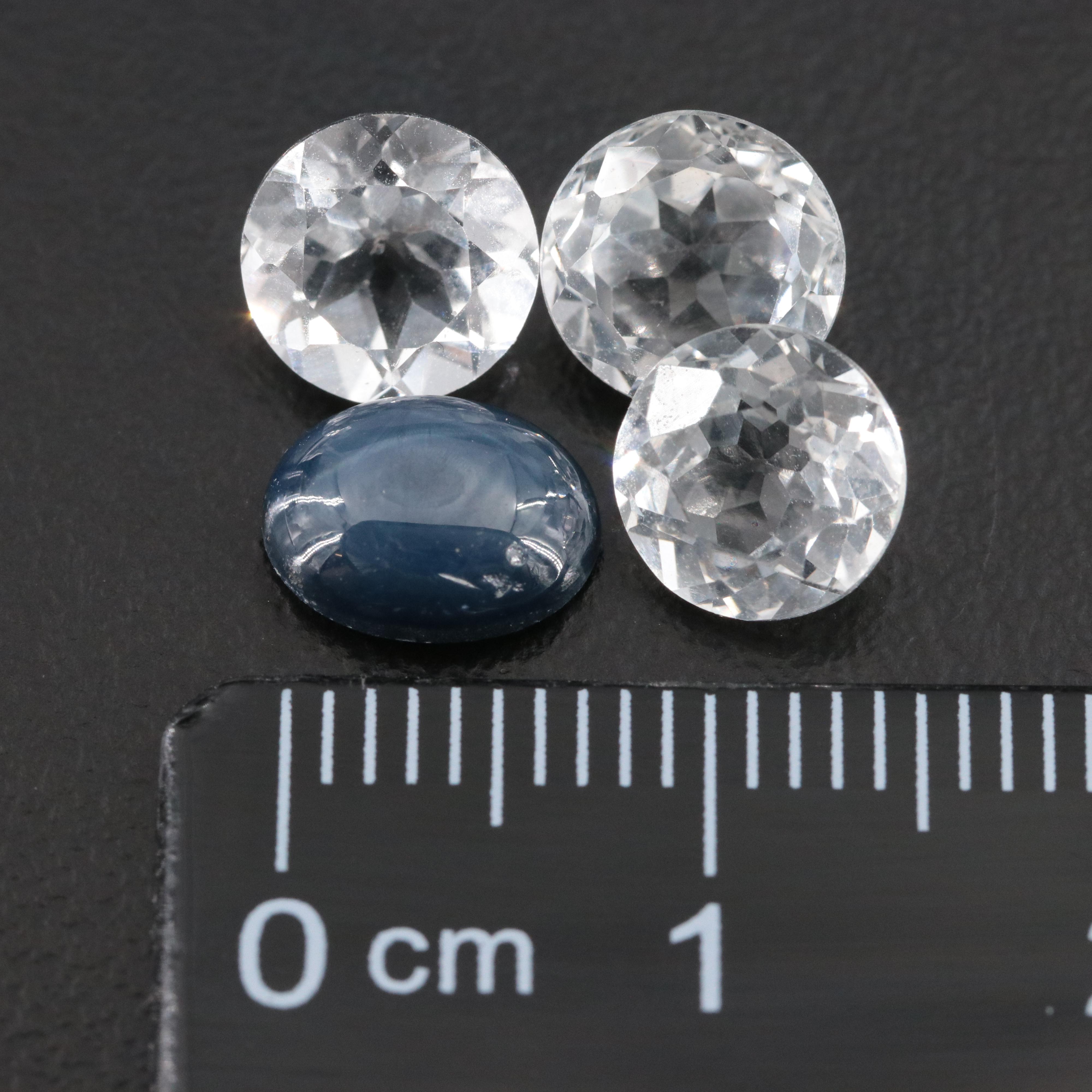 Loose 6.92 CTW Star Sapphire and White Topaz Lot