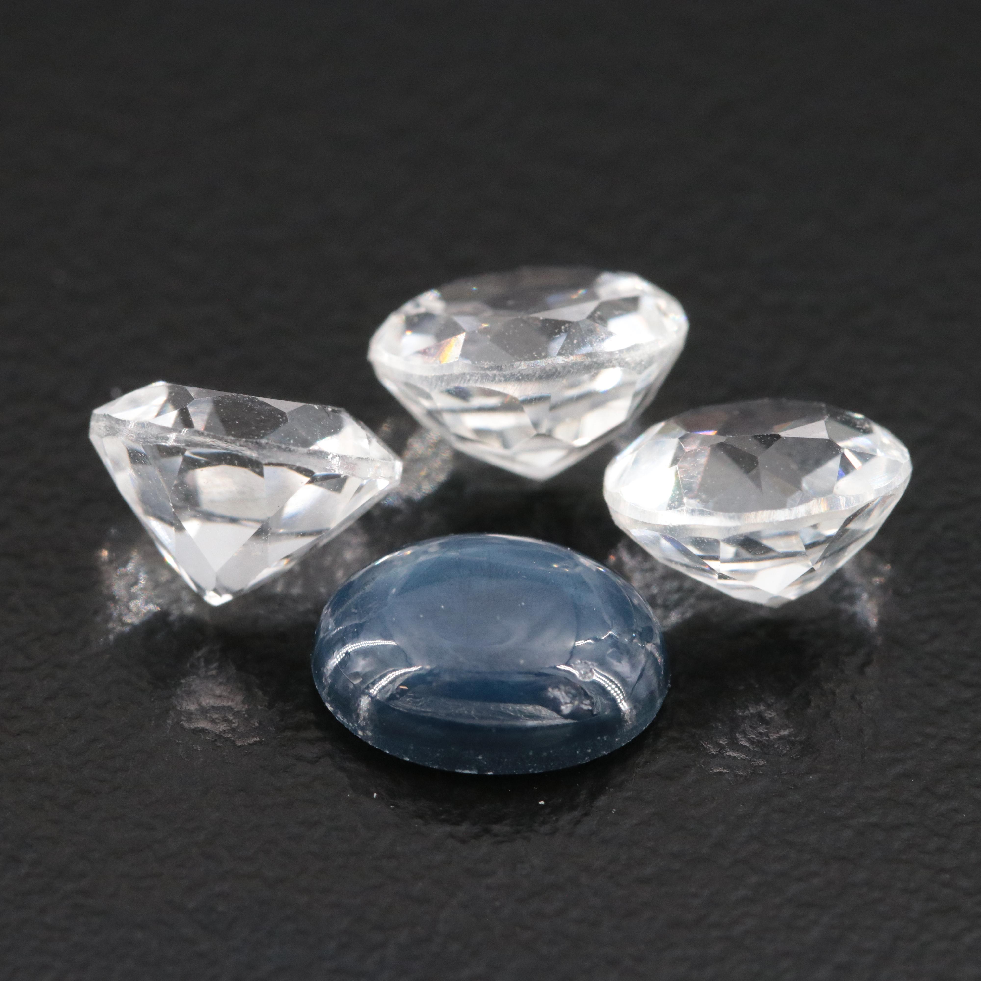 Loose 6.92 CTW Star Sapphire and White Topaz Lot