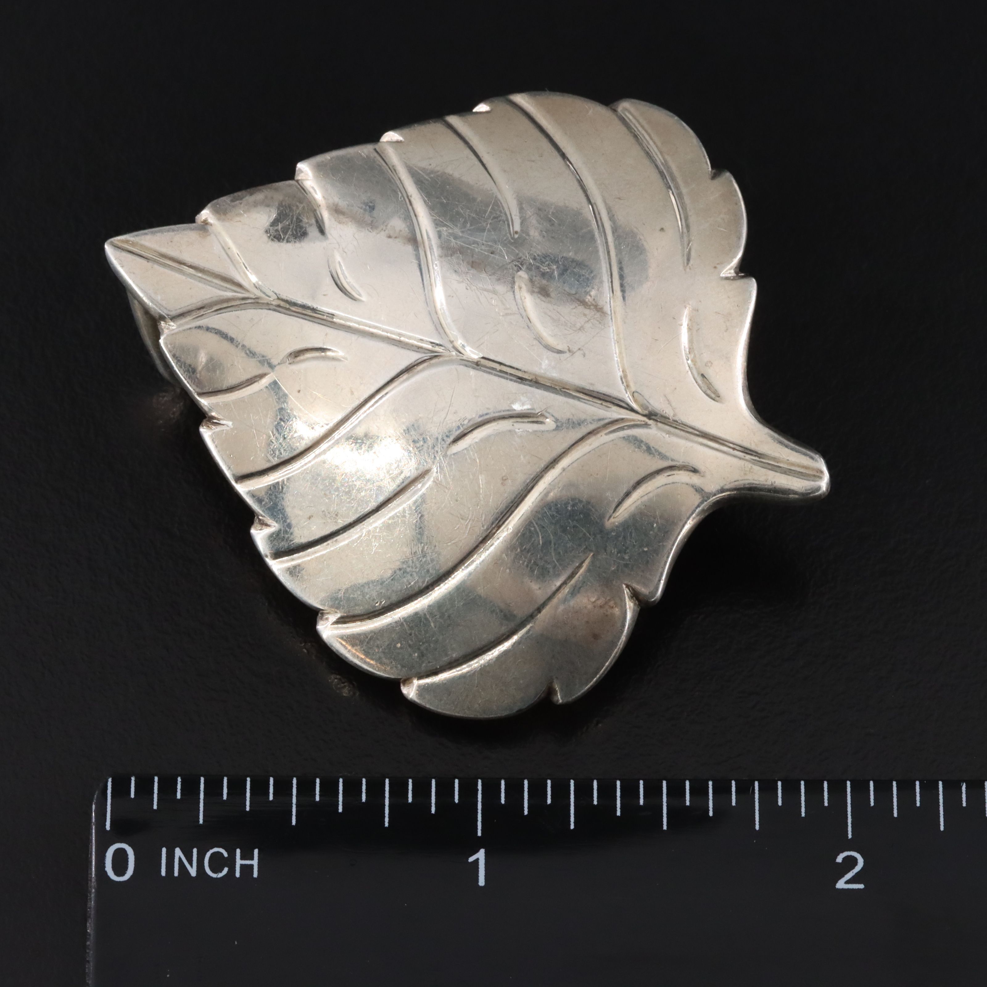 Jim Hayes Leaf Buckle Featured in Sterling CZ Jewelry Collection