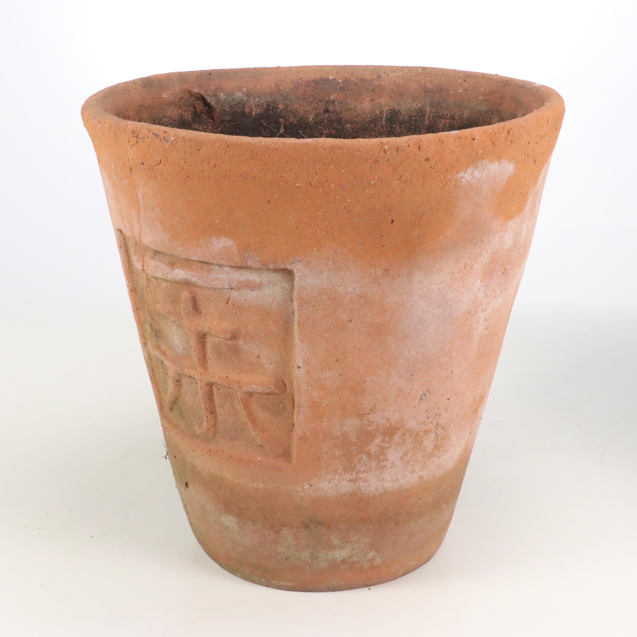 Terracotta Flower Pot with Bent Metal Garden Baskets