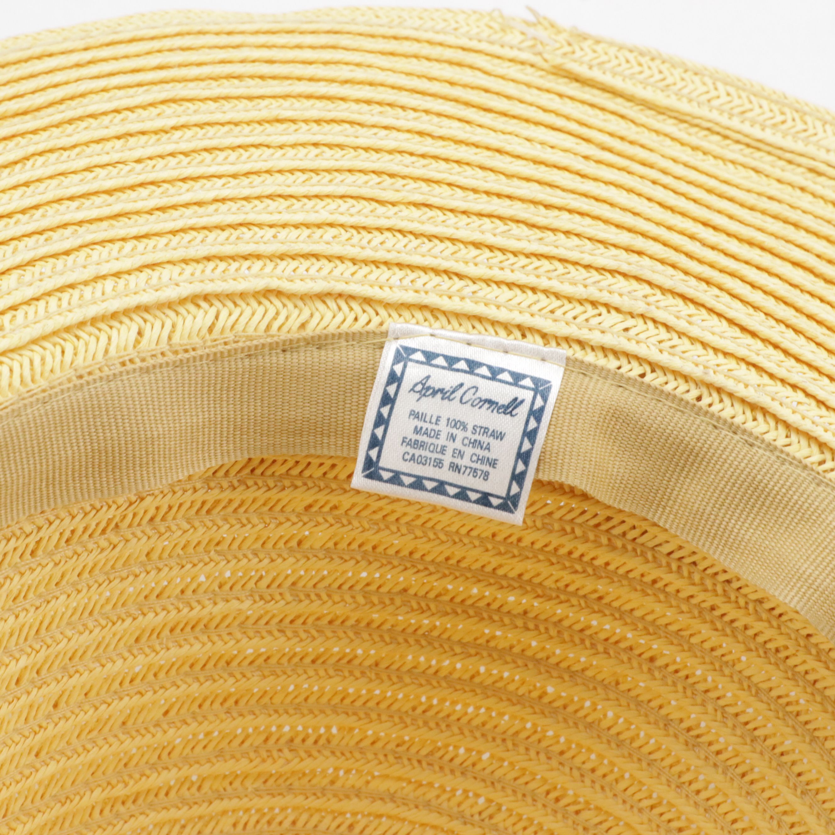April Cornell and August Hat Company Straw Sun Hats with Bow and Feather Details