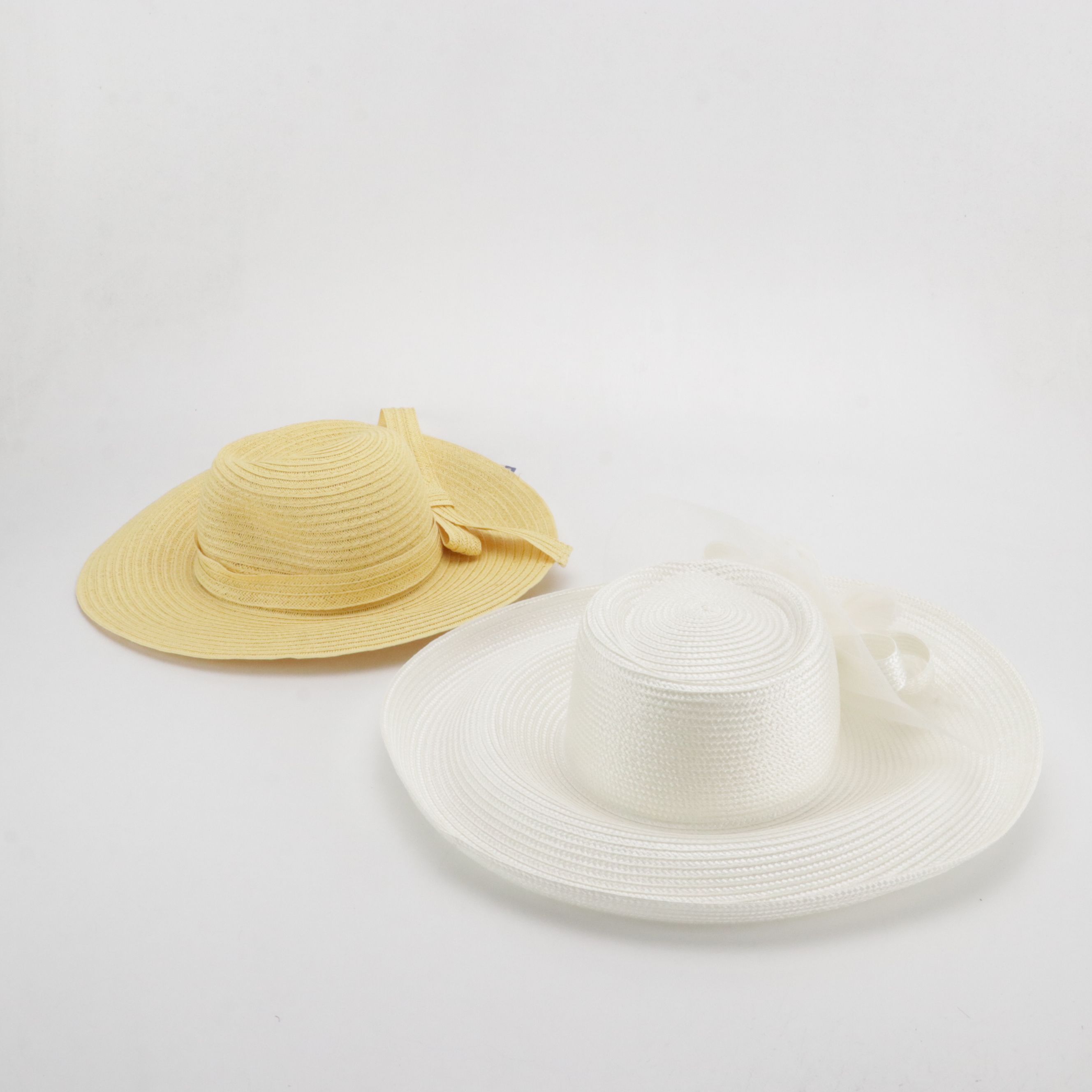 April Cornell and August Hat Company Straw Sun Hats with Bow and Feather Details