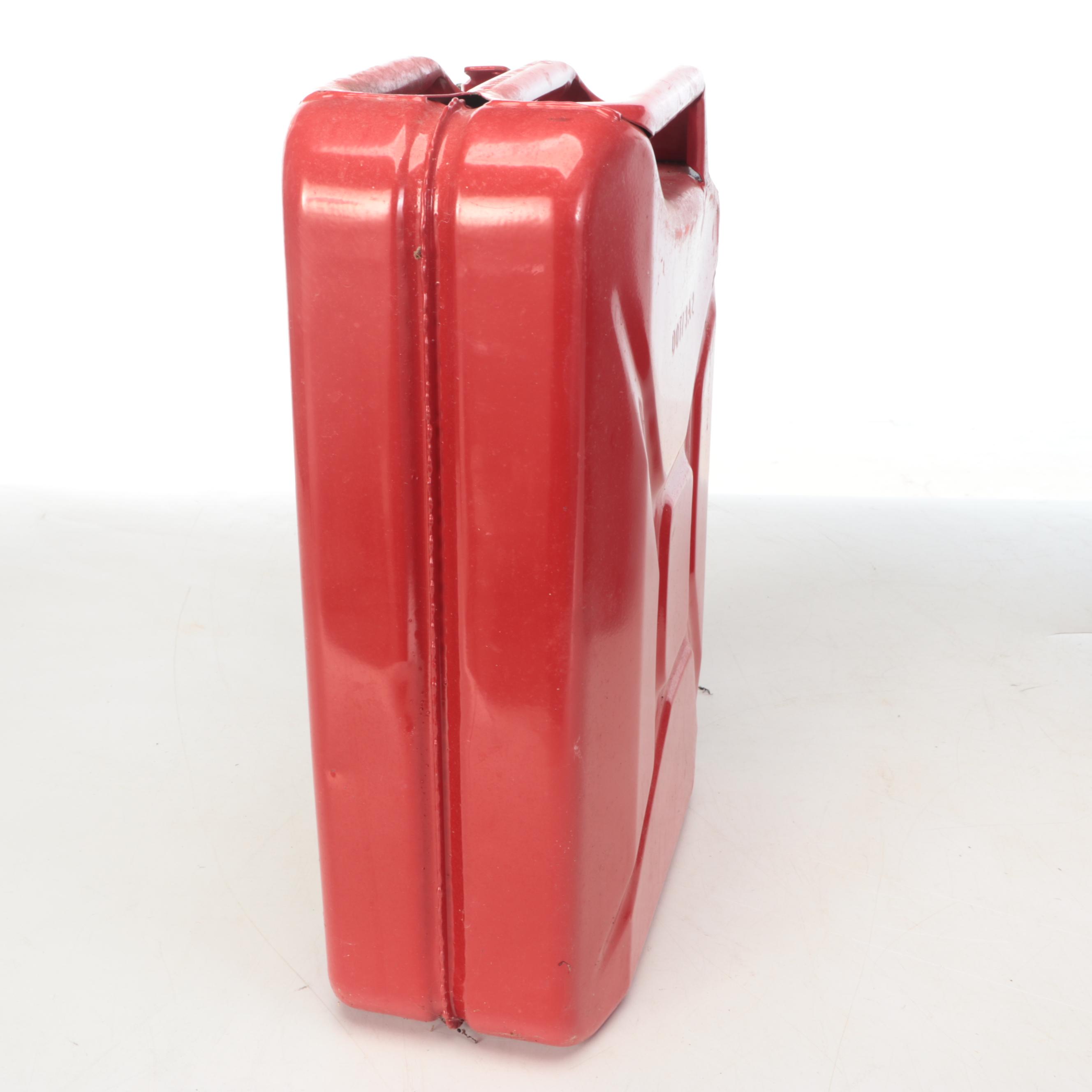 Two Red Metal Gasoline Cans