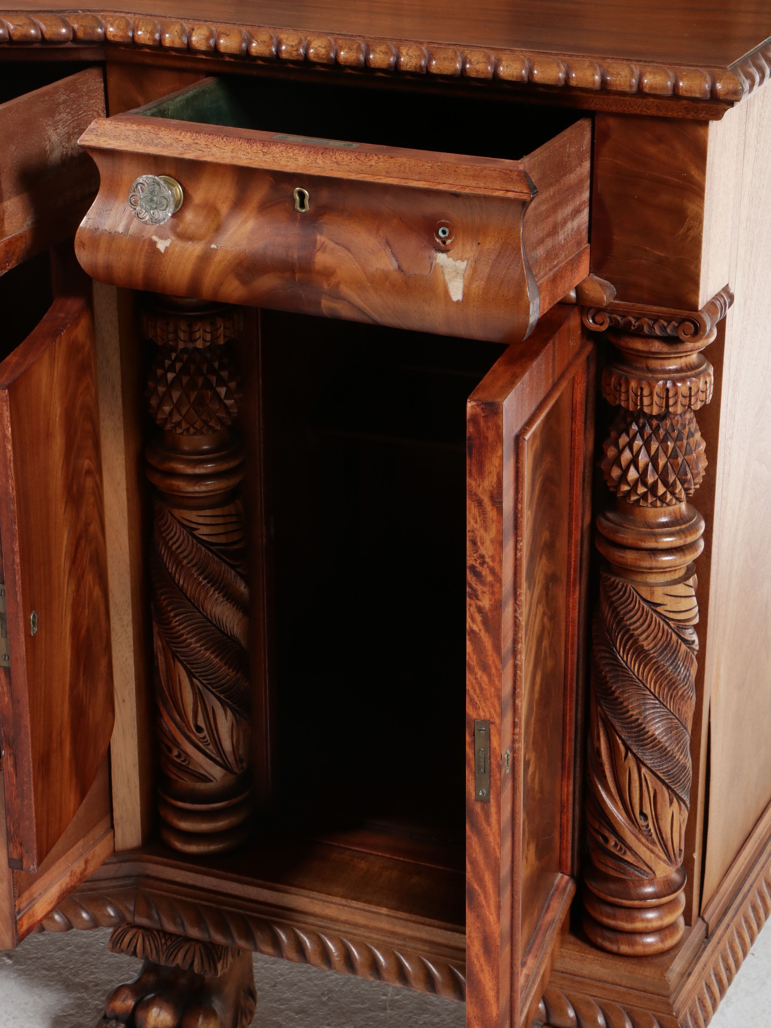 American Empire Carved Pineapple and Lions Paw Flame Mahogany Sideboard