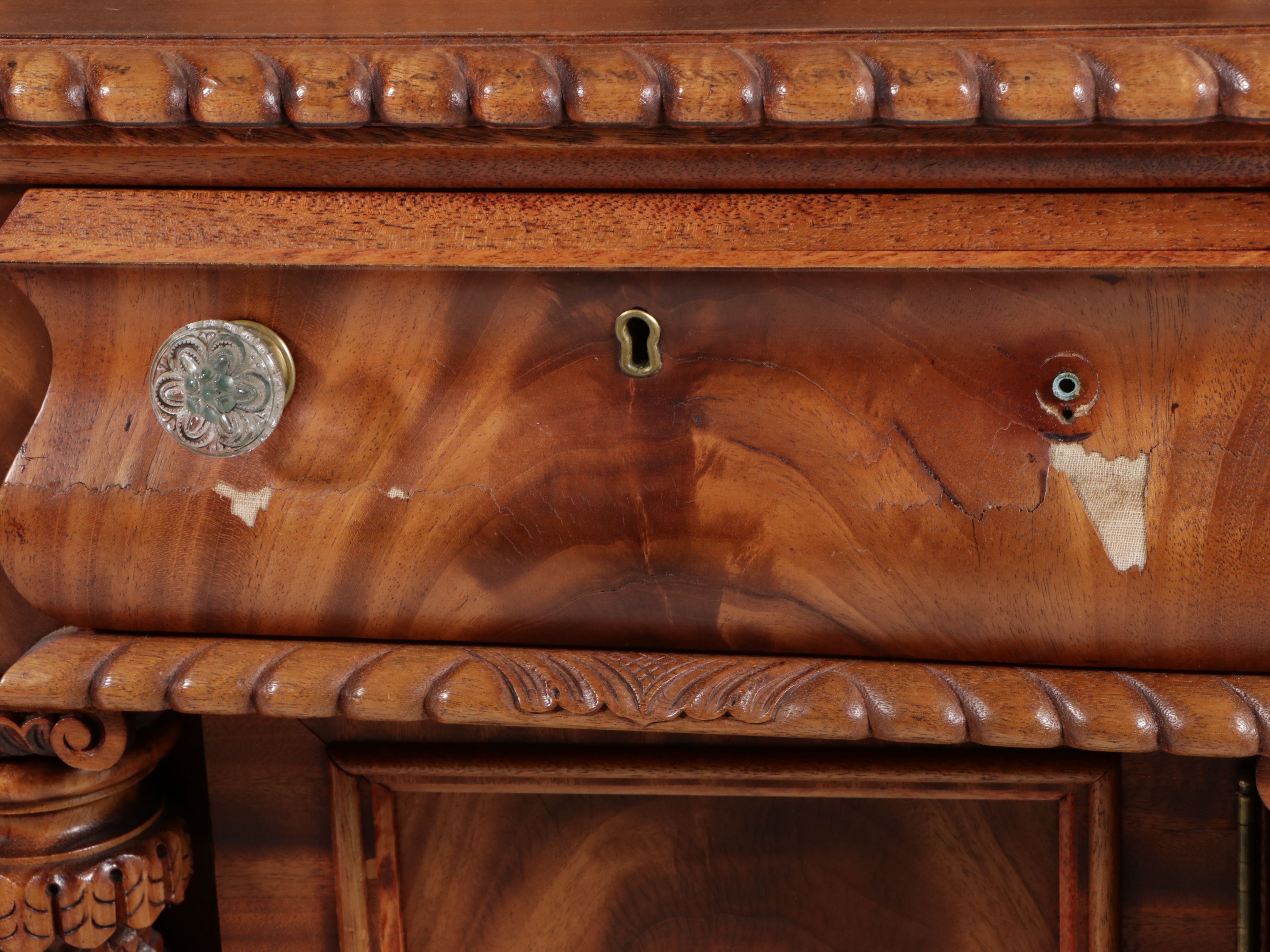 American Empire Carved Pineapple and Lions Paw Flame Mahogany Sideboard