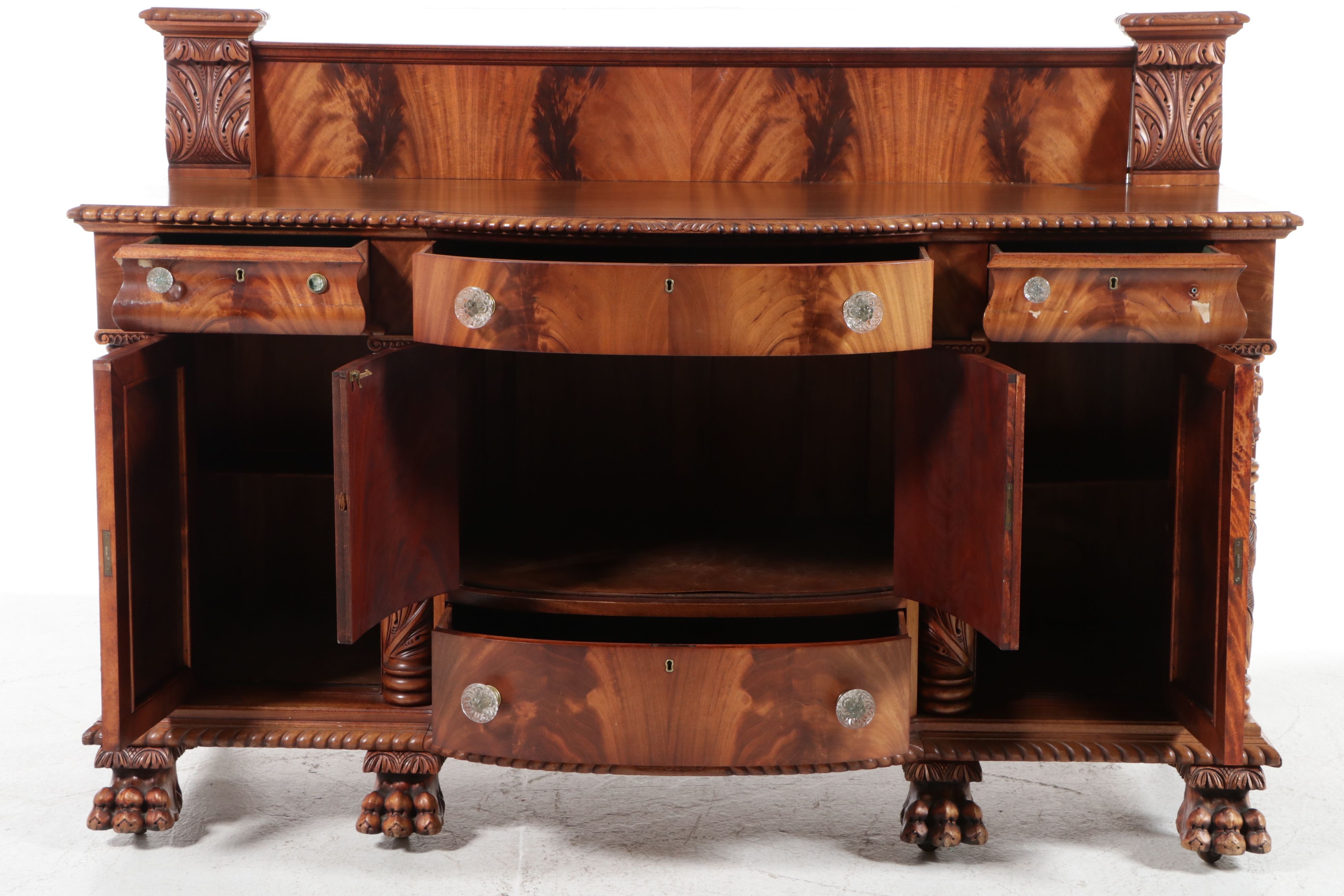 American Empire Carved Pineapple and Lions Paw Flame Mahogany Sideboard
