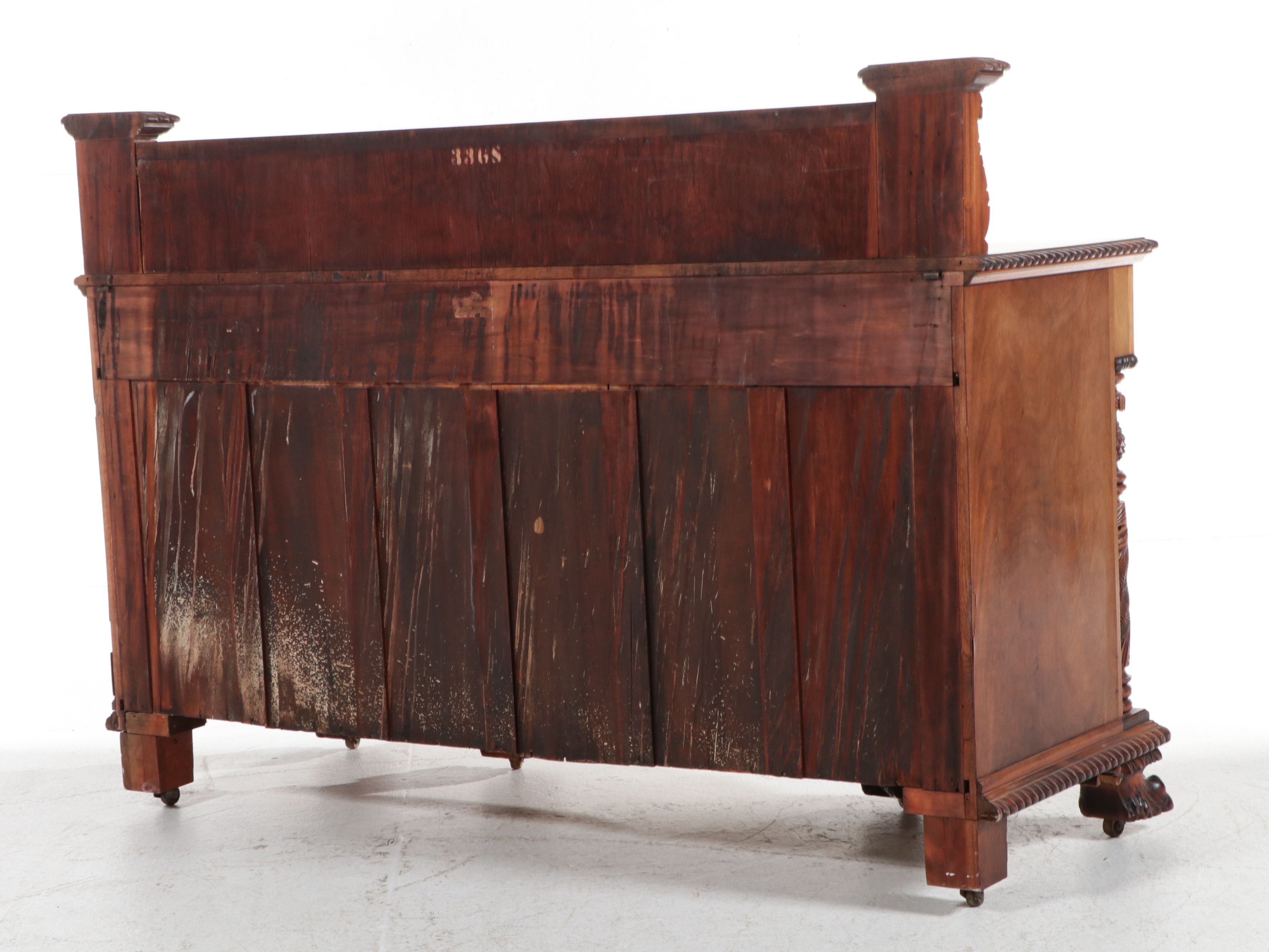 American Empire Carved Pineapple and Lions Paw Flame Mahogany Sideboard