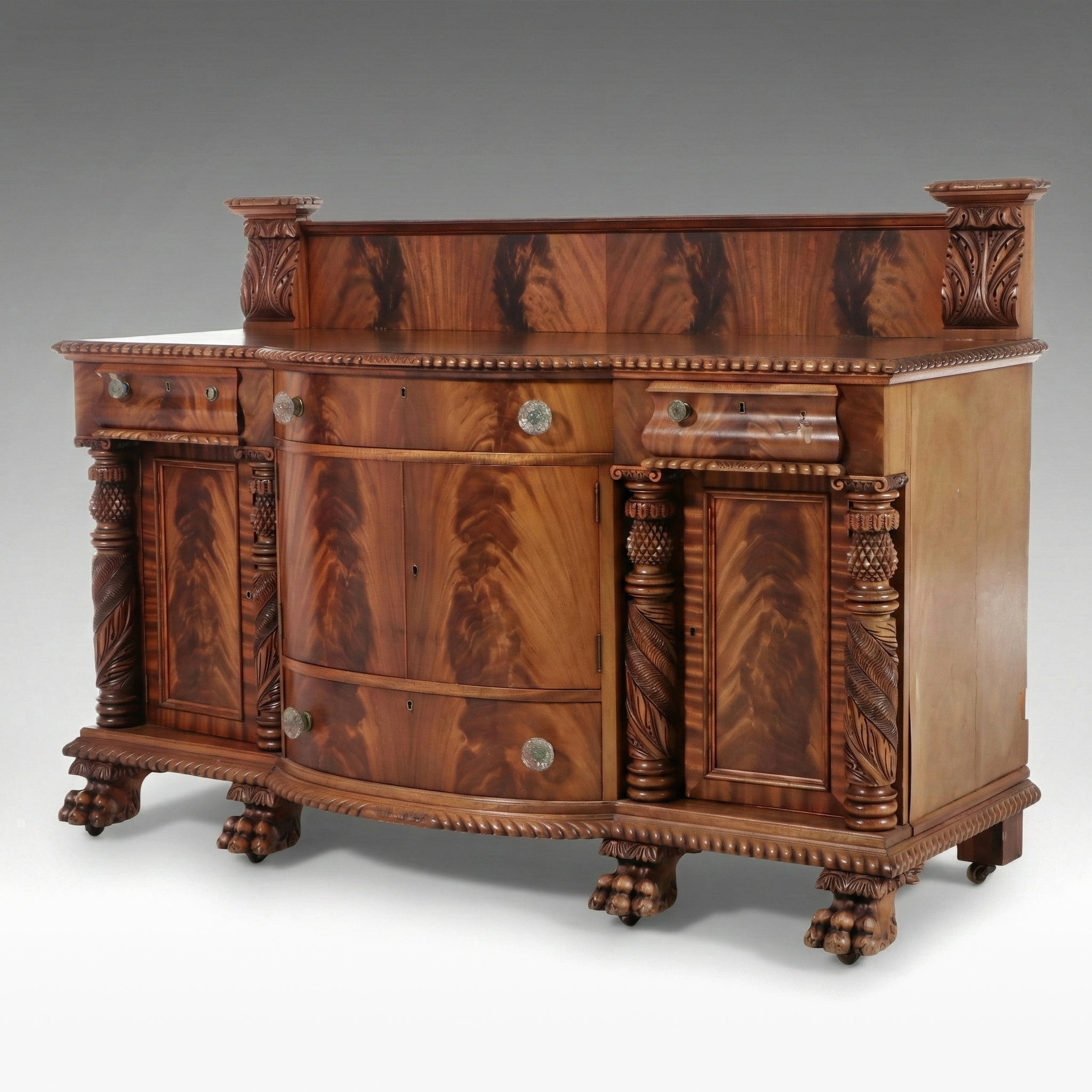 American Empire Carved Pineapple and Lions Paw Flame Mahogany Sideboard