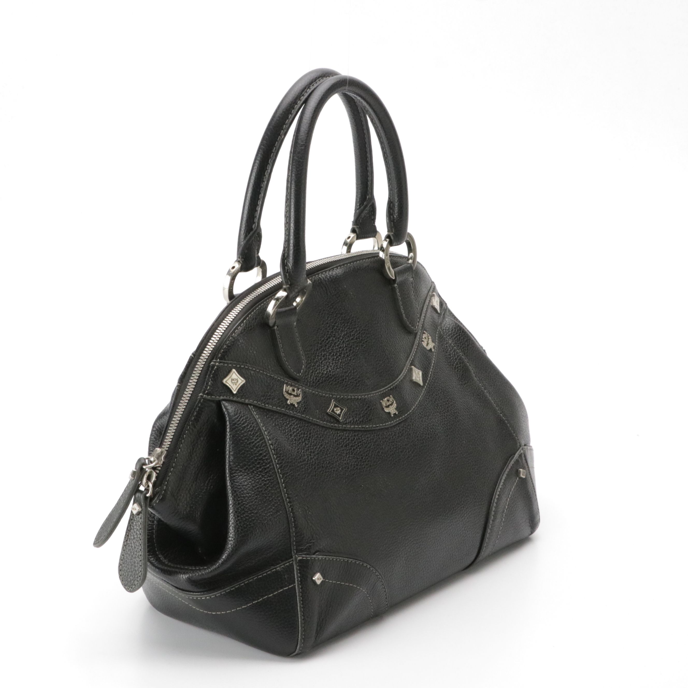 MCM Domed Boston Handbag in Logo Studded Black Leather