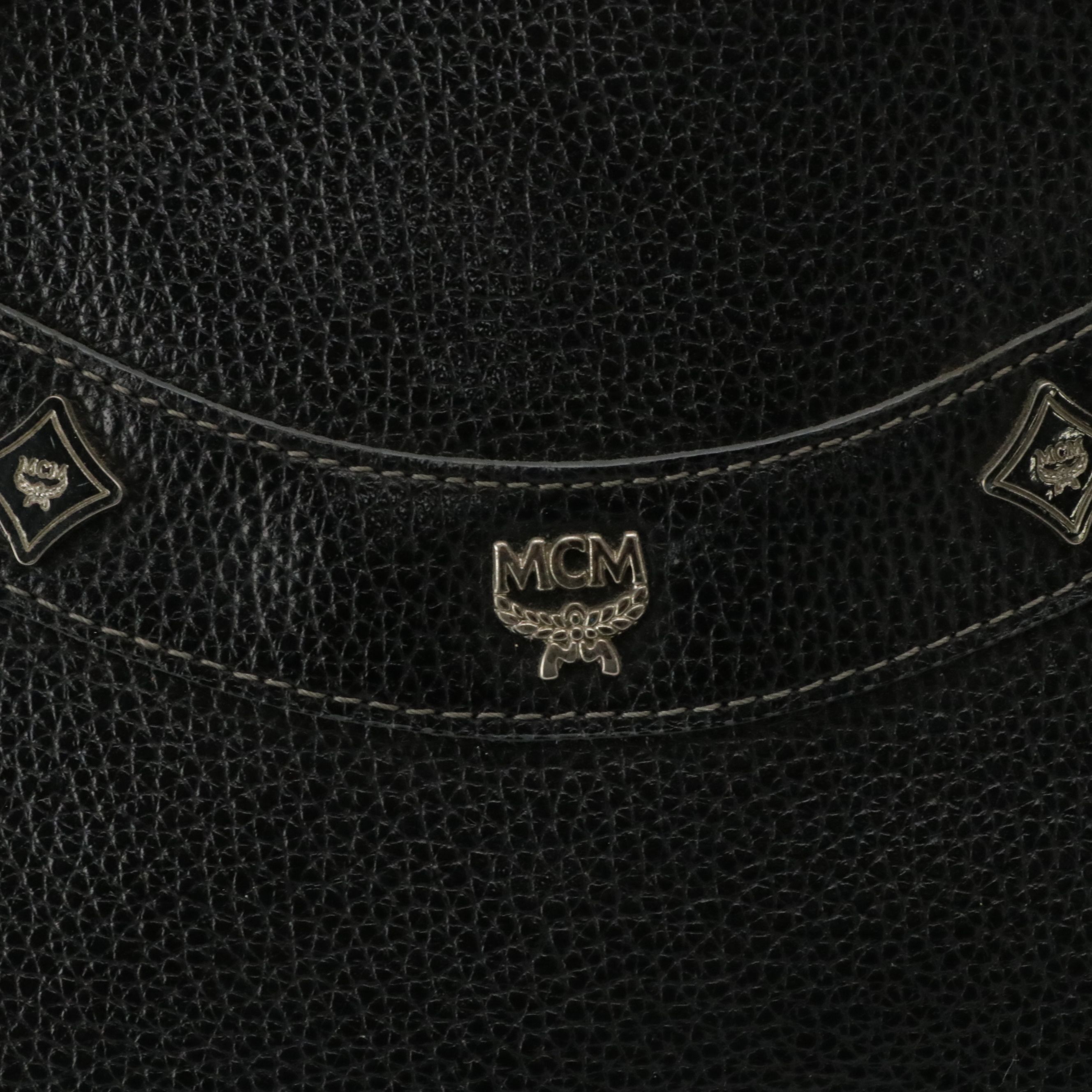 MCM Domed Boston Handbag in Logo Studded Black Leather