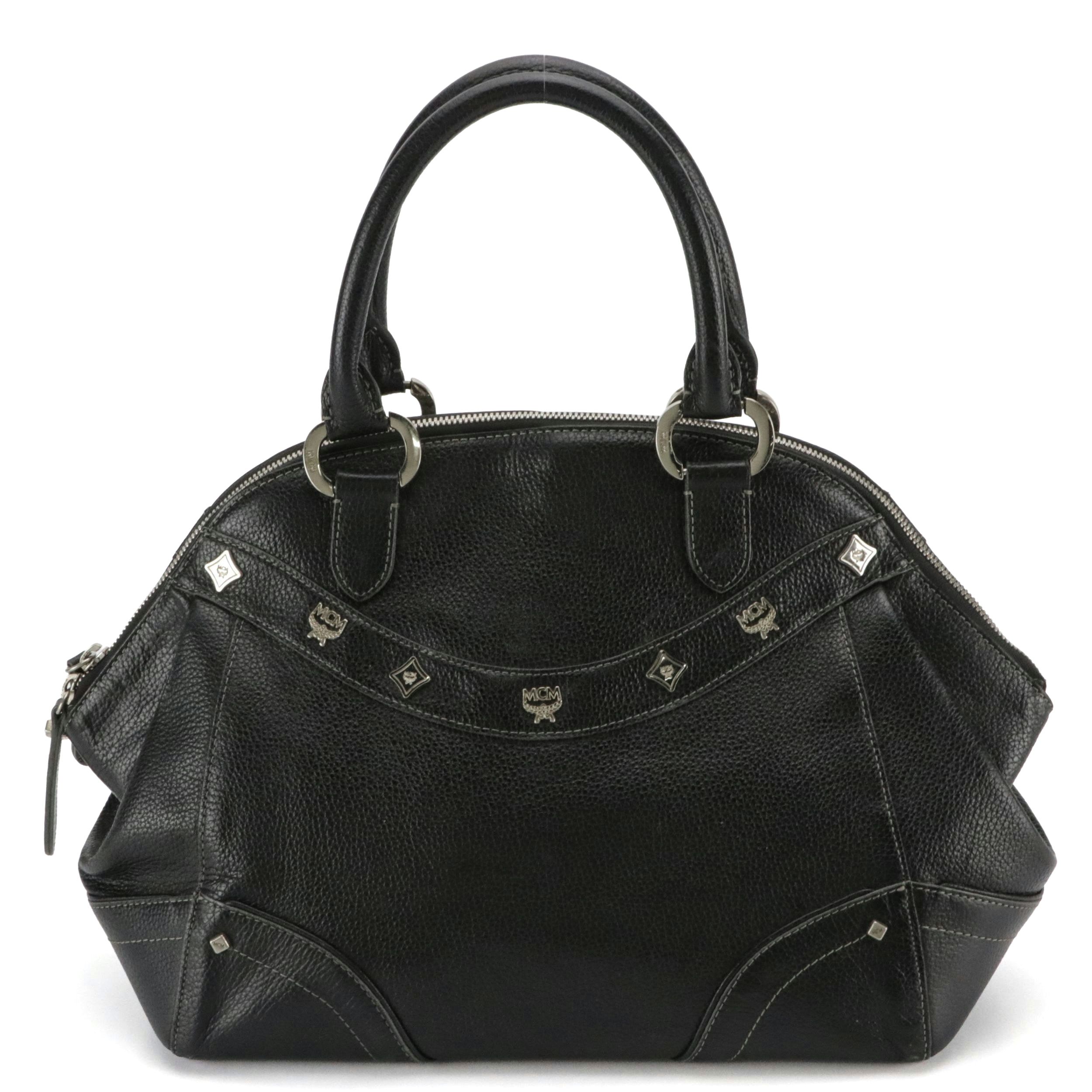 MCM Domed Boston Handbag in Logo Studded Black Leather