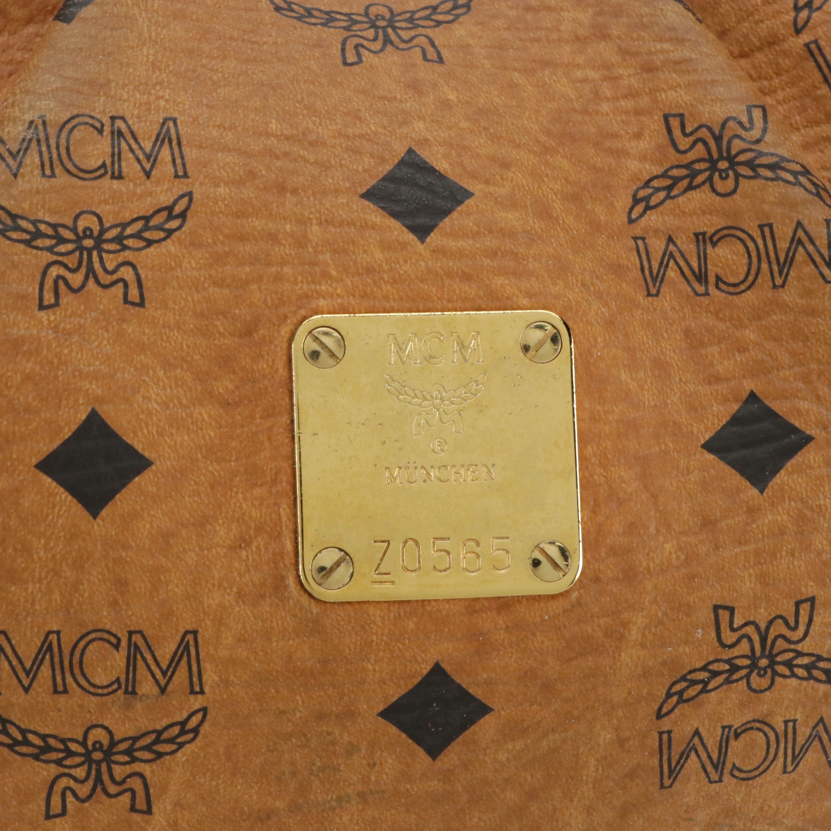 MCM Pleated Hobo Bag in Cognac Visetos Canvas with Leather Buckle Trim