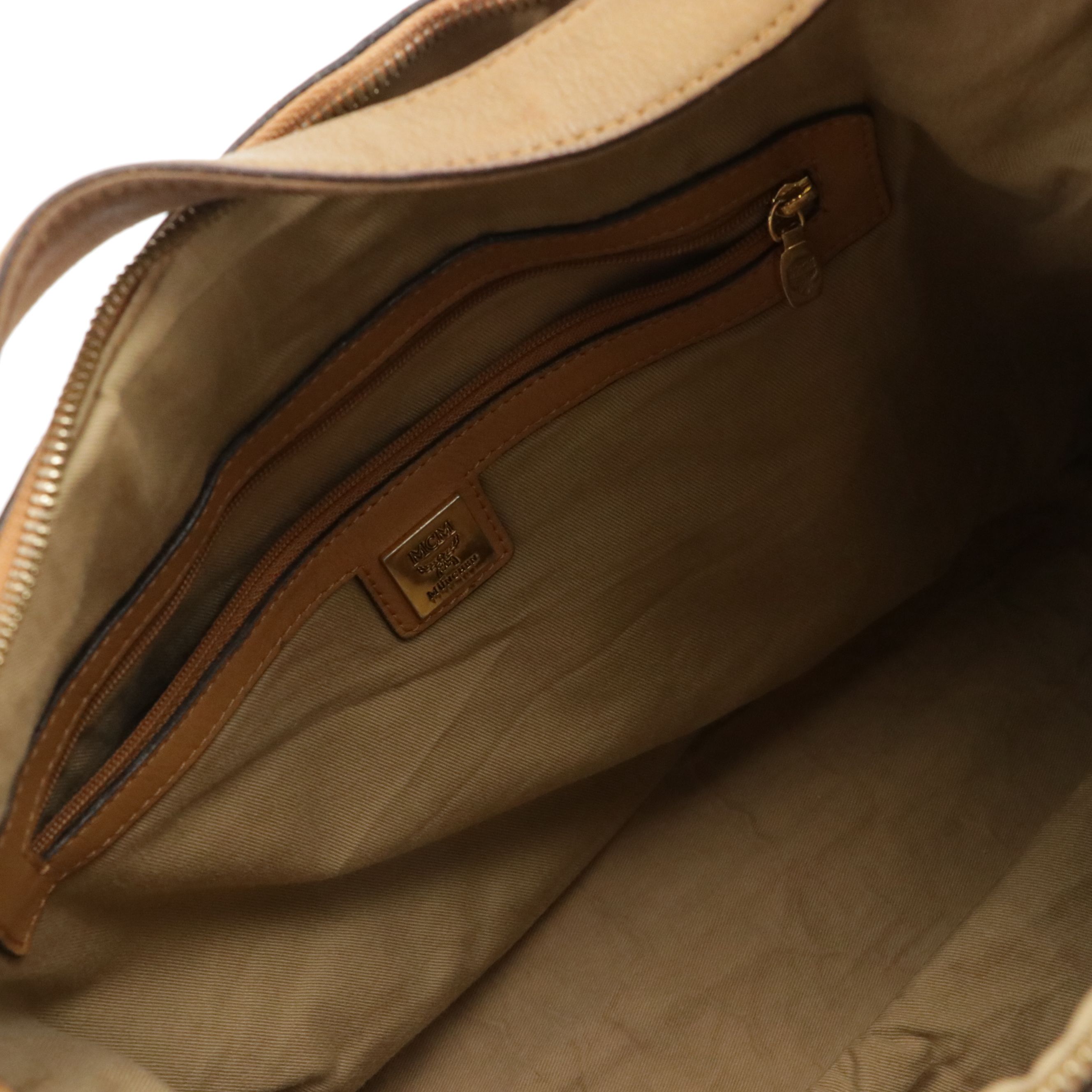 MCM Pleated Hobo Bag in Cognac Visetos Canvas with Leather Buckle Trim