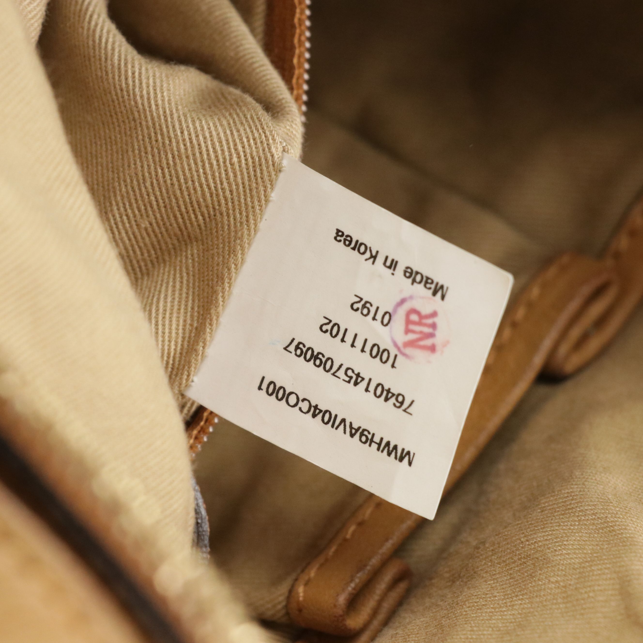 MCM Pleated Hobo Bag in Cognac Visetos Canvas with Leather Buckle Trim