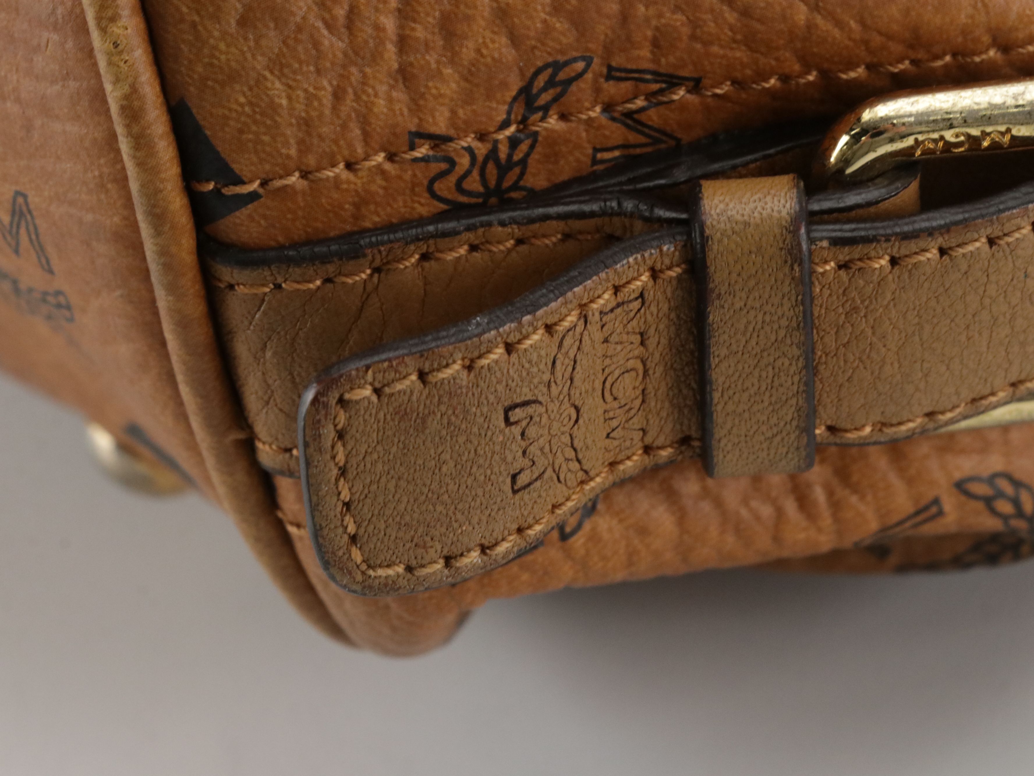 MCM Pleated Hobo Bag in Cognac Visetos Canvas with Leather Buckle Trim