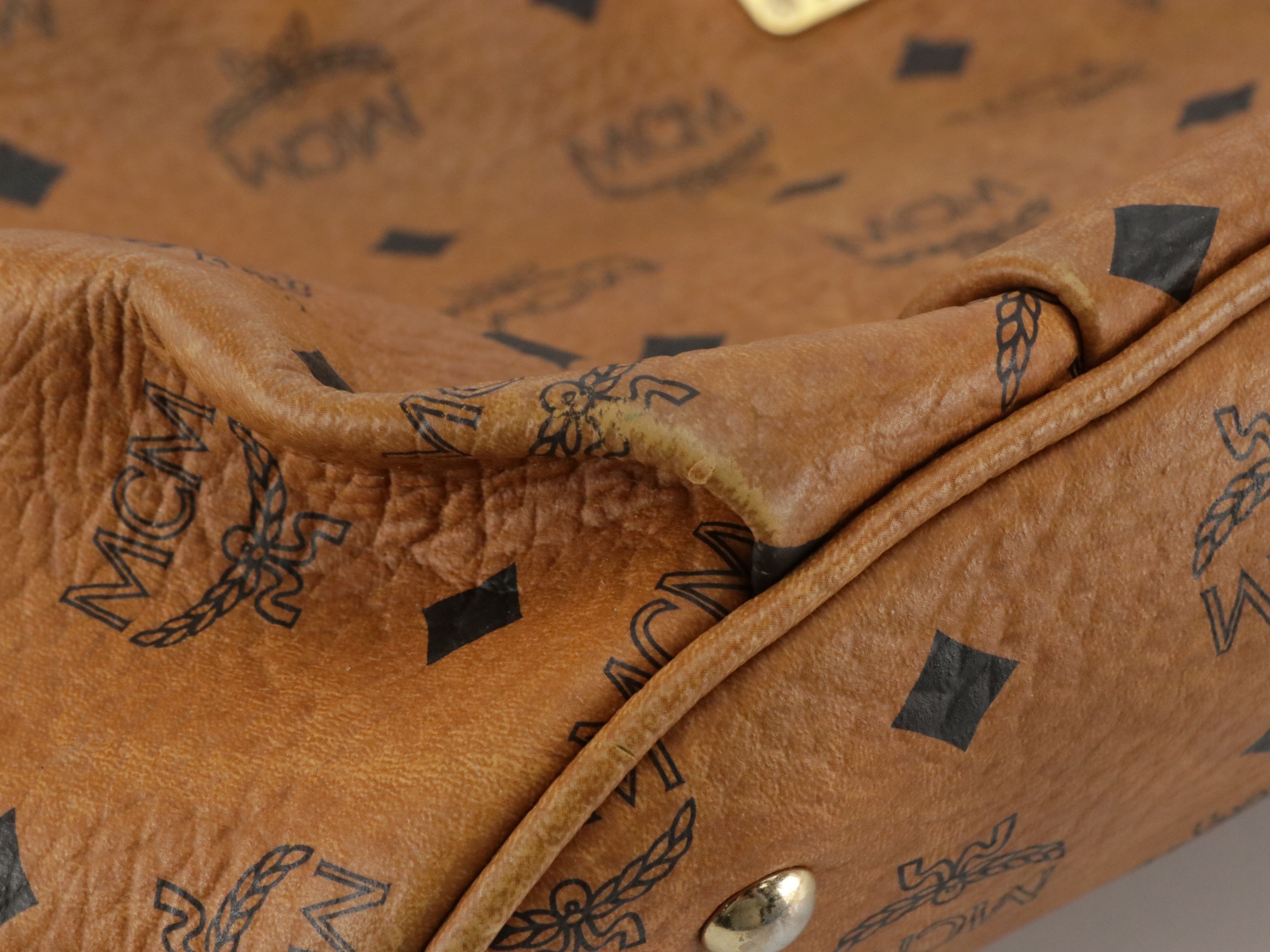 MCM Pleated Hobo Bag in Cognac Visetos Canvas with Leather Buckle Trim