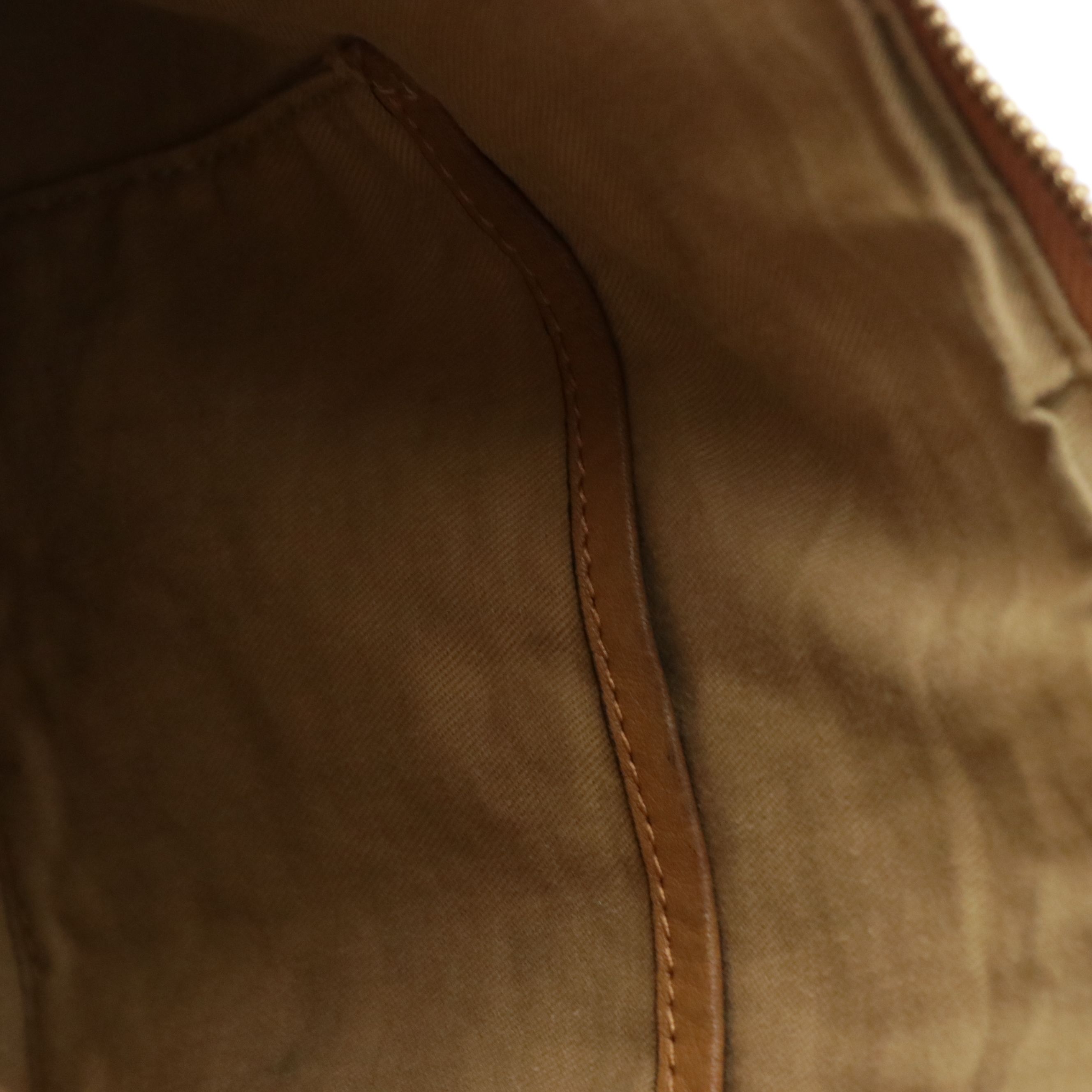 MCM Pleated Hobo Bag in Cognac Visetos Canvas with Leather Buckle Trim