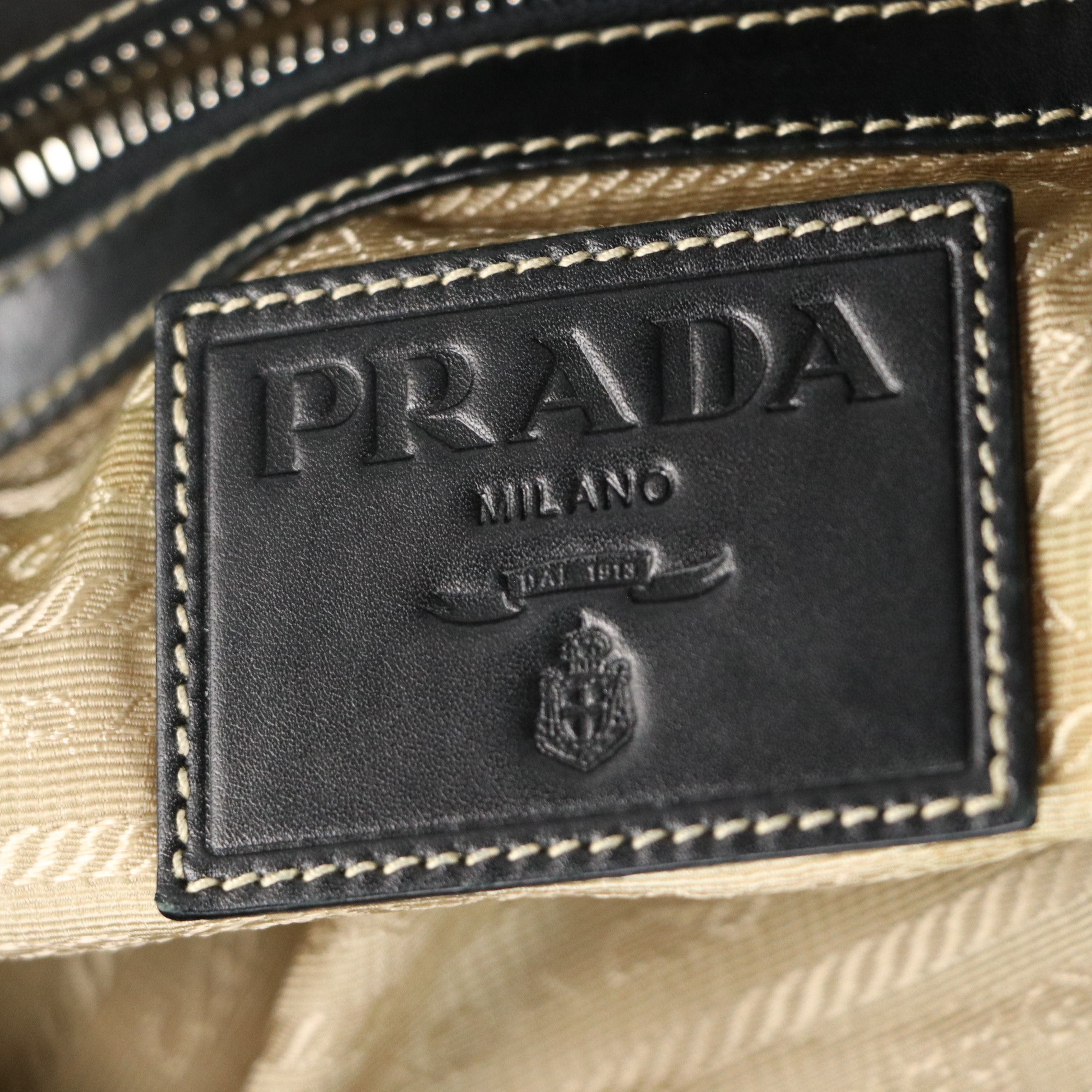 Prada Canapa Shoulder Bag in Logo Jacquard Canvas and Leather