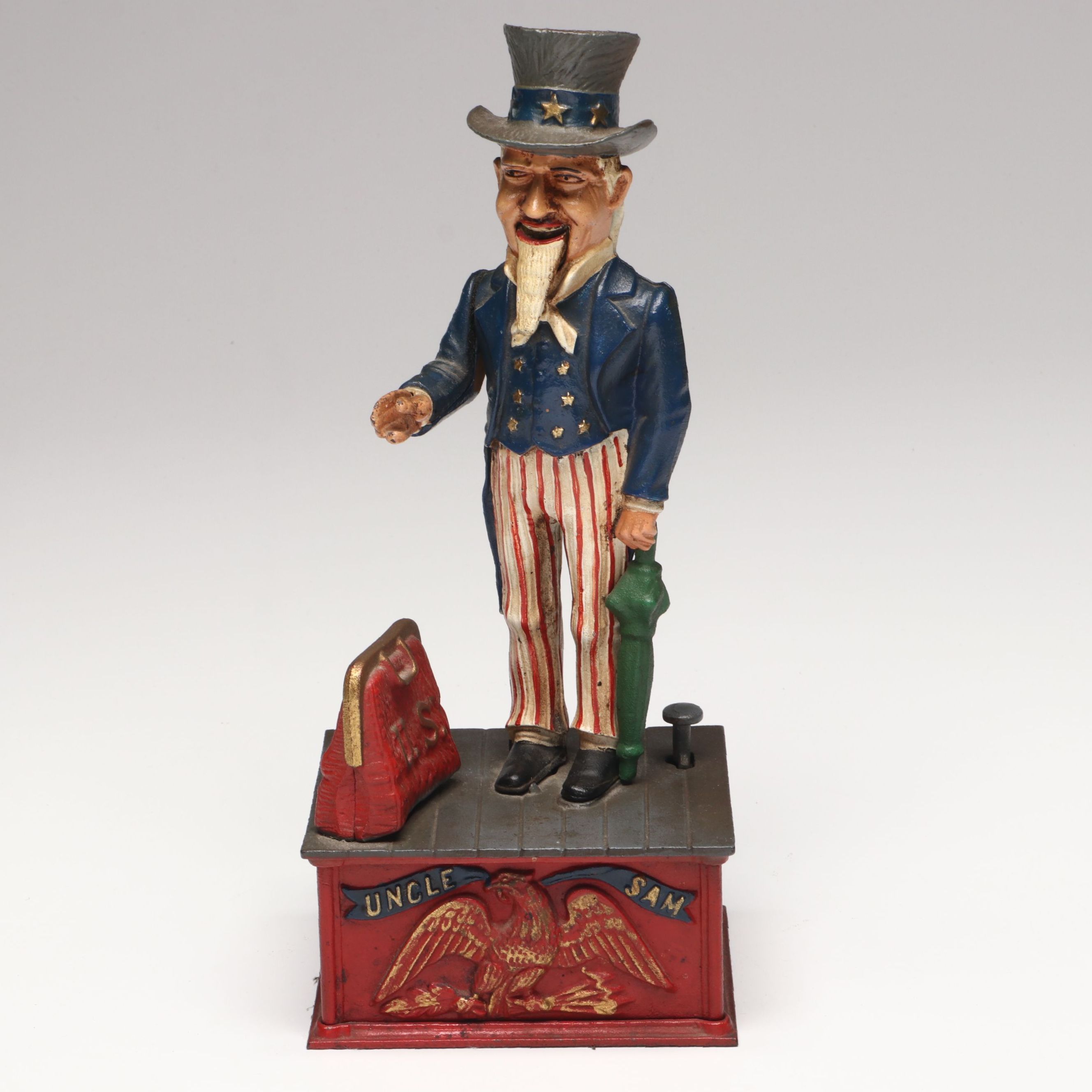 The Book of Knowledge Cast Iron Uncle Sam Mechanical Coin Bank