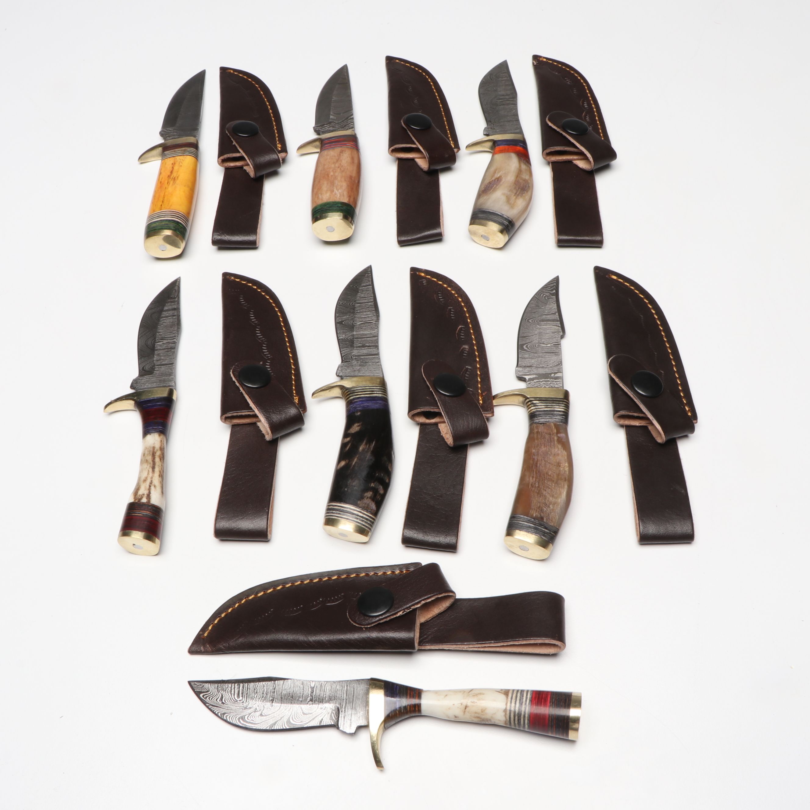 Bone and Antler Handled Damascus Steel Skinner Knives in Leather Scabbards