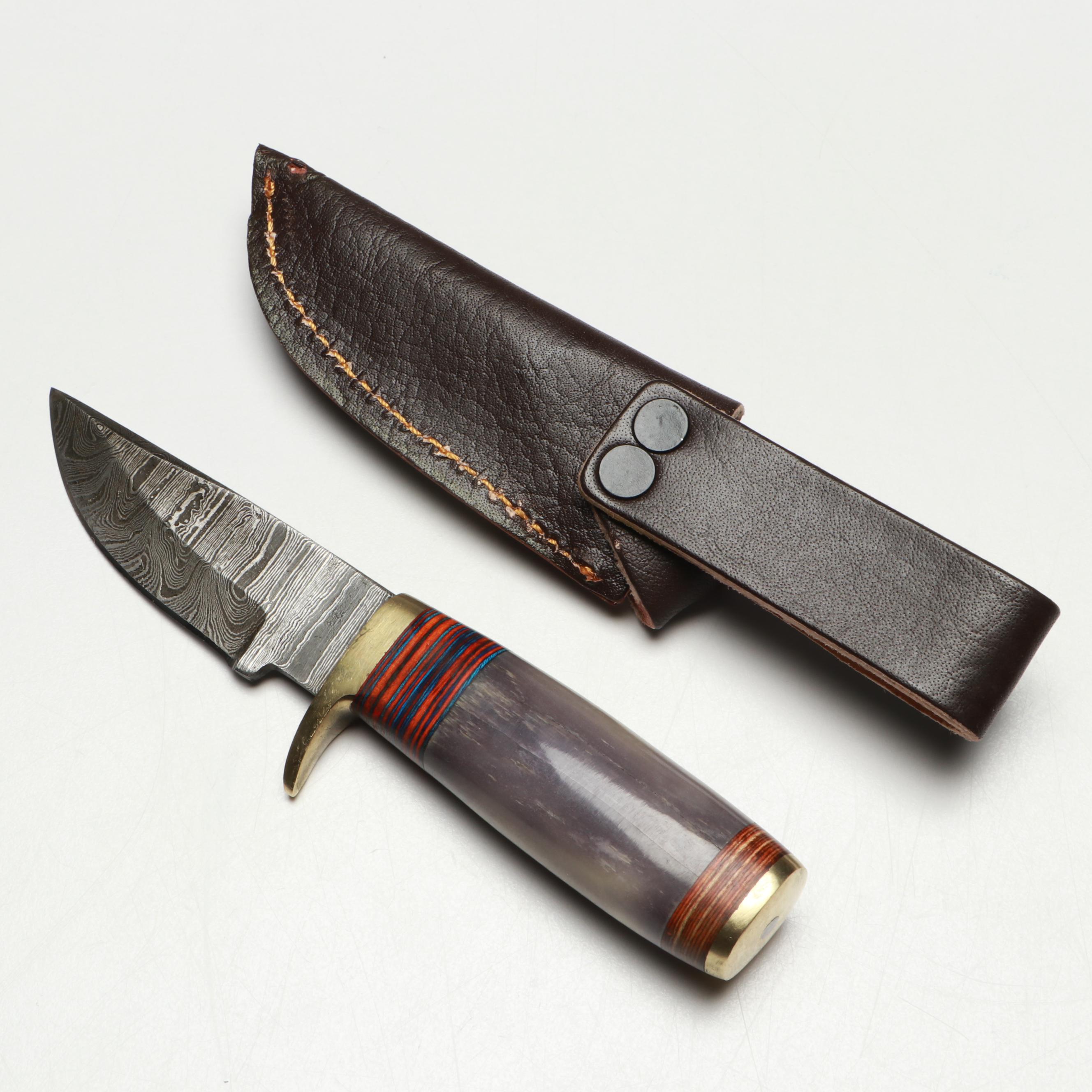 Damascus Steel and Bone Handled Skinner Knives with Hunting Knives in Scabbards