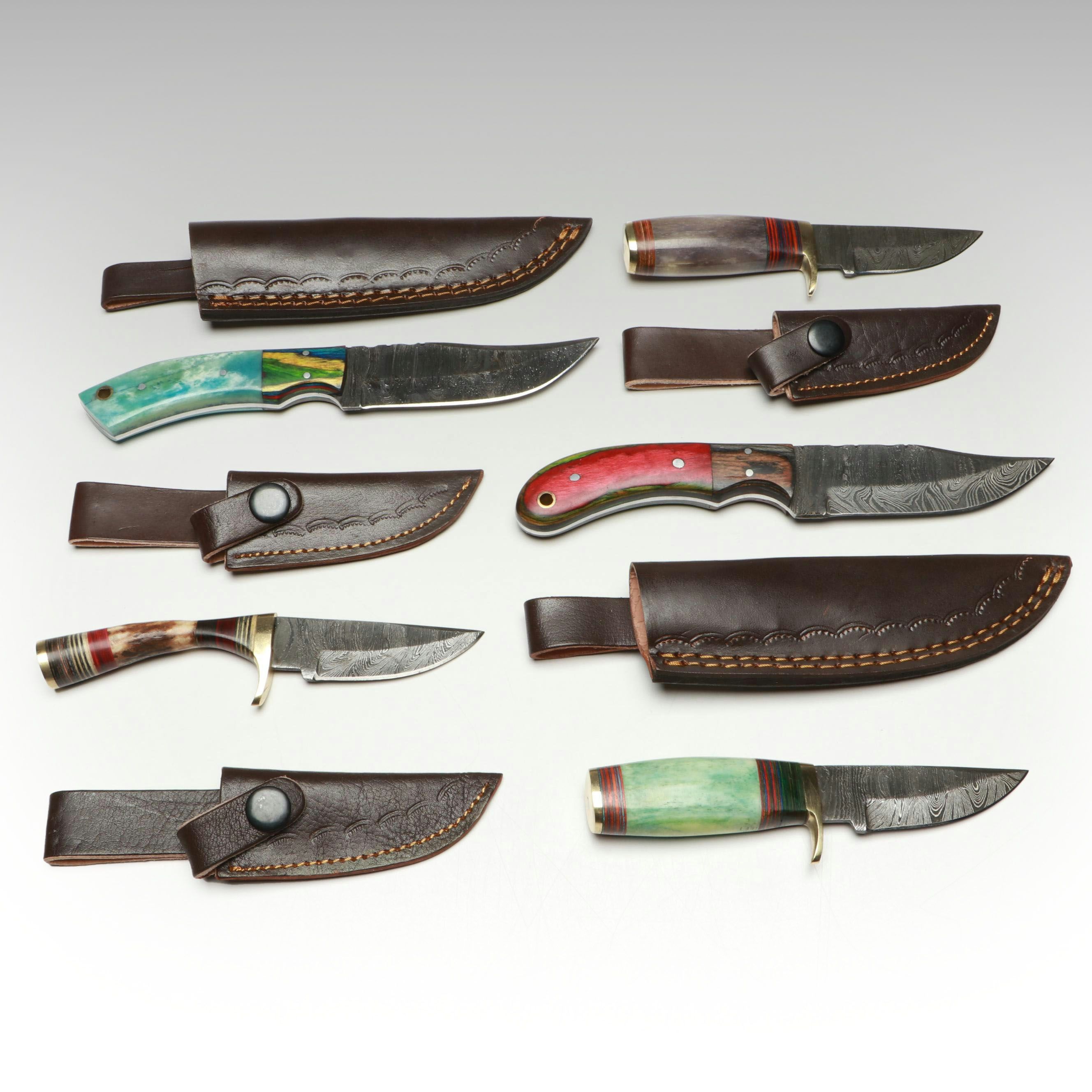 Damascus Steel and Bone Handled Skinner Knives with Hunting Knives in Scabbards