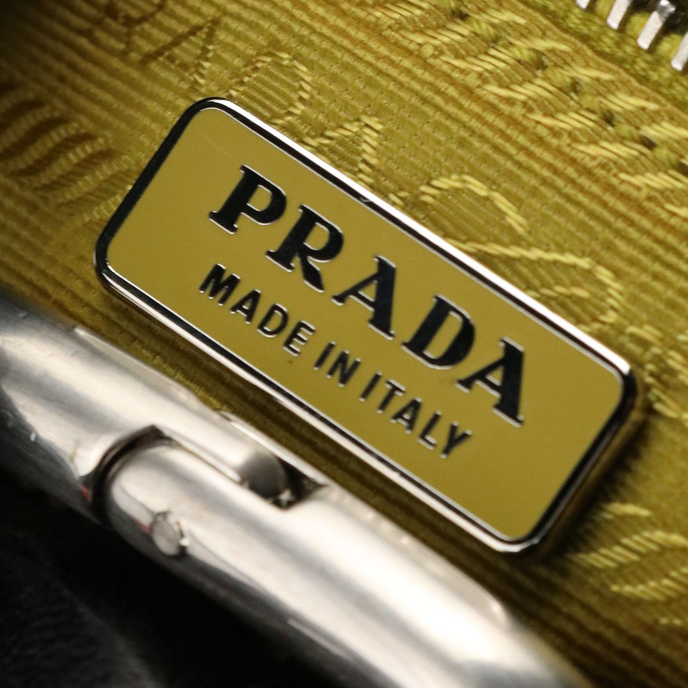 Prada Mini Metal Ring Handbag in Black Lambskin Leather