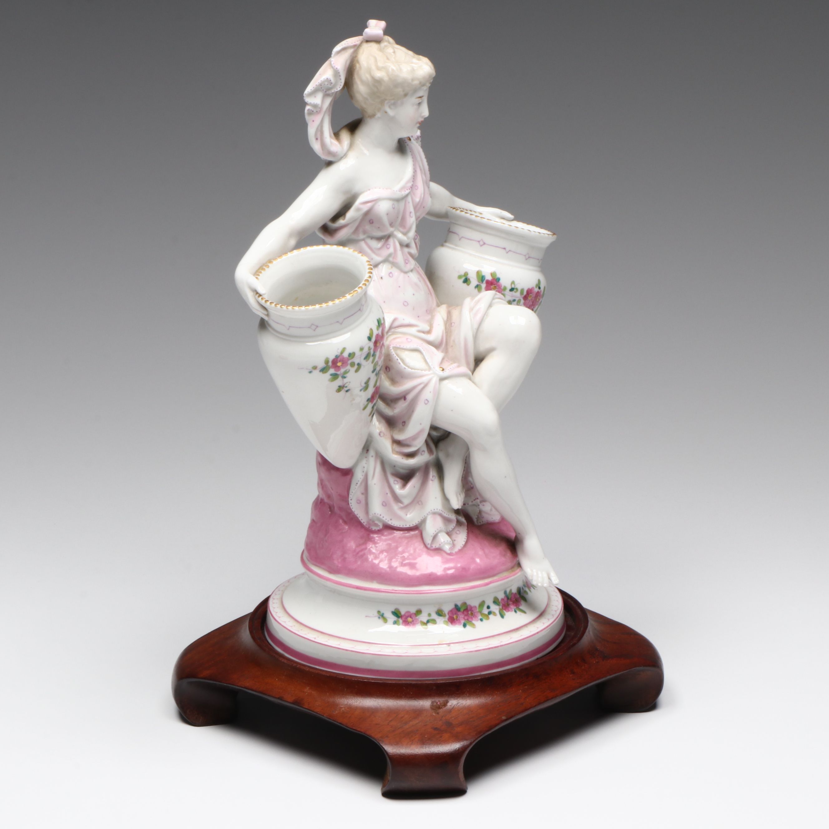 French Neoclassical Style Porcelain Figure with Other Bone China Teacups
