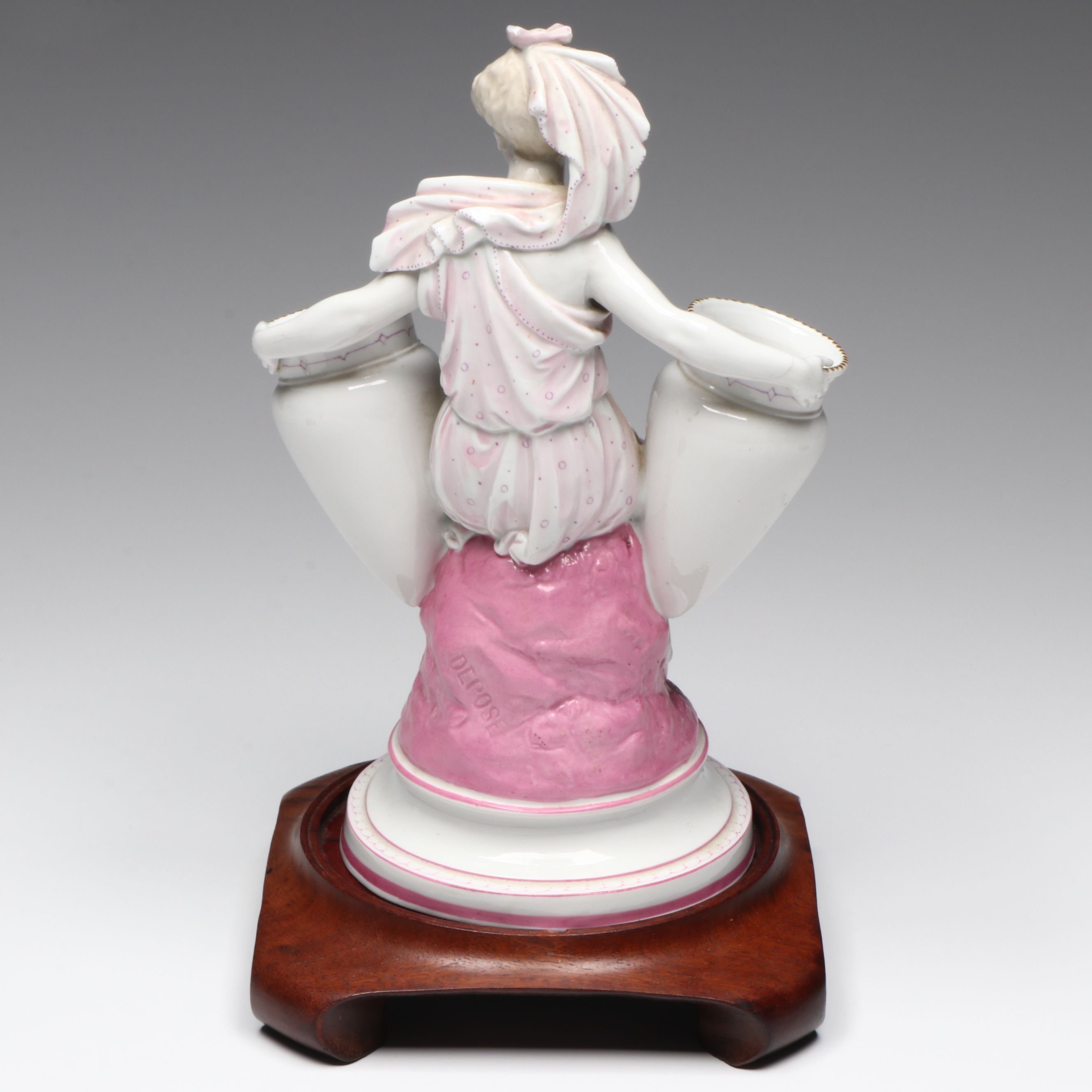 French Neoclassical Style Porcelain Figure with Other Bone China Teacups