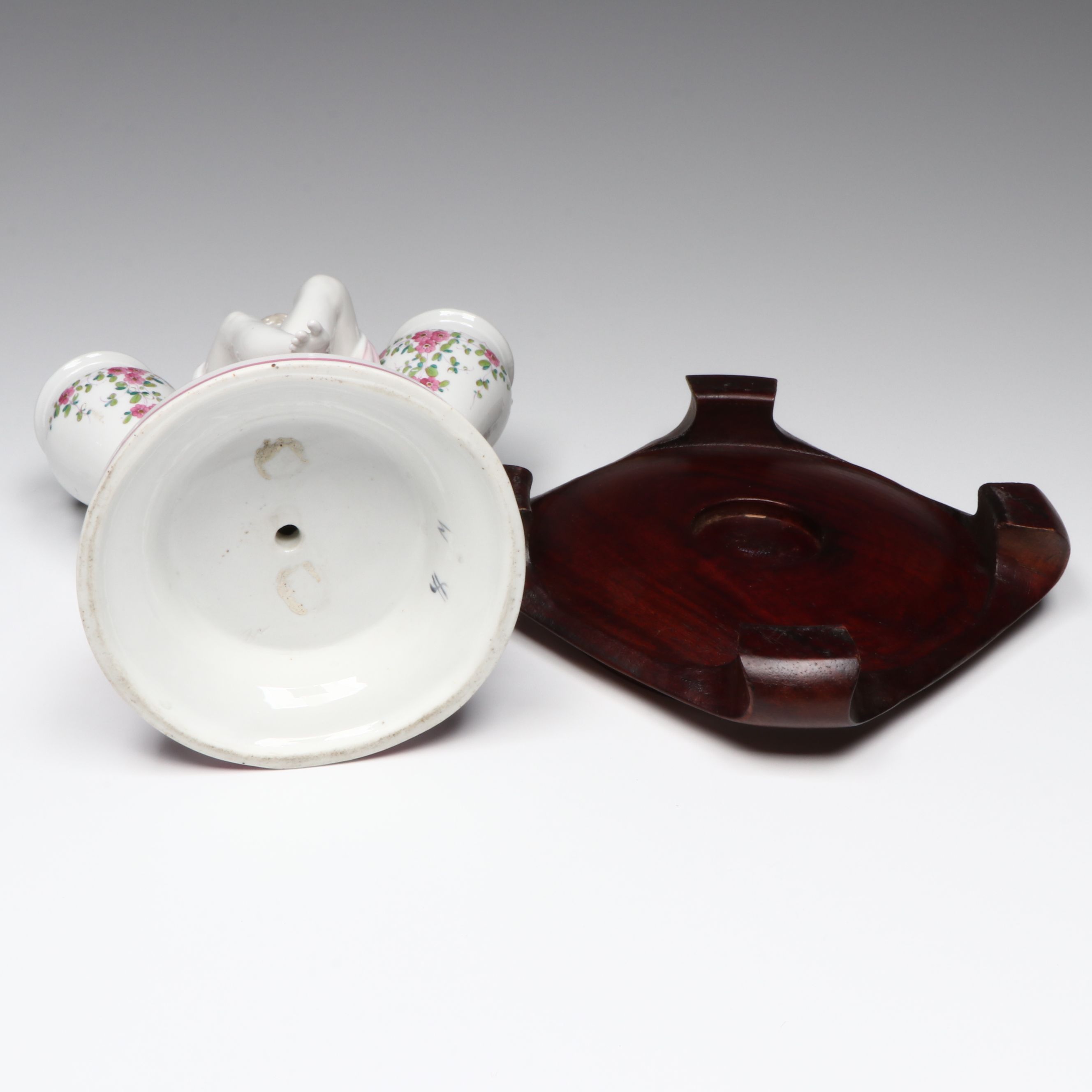 French Neoclassical Style Porcelain Figure with Other Bone China Teacups