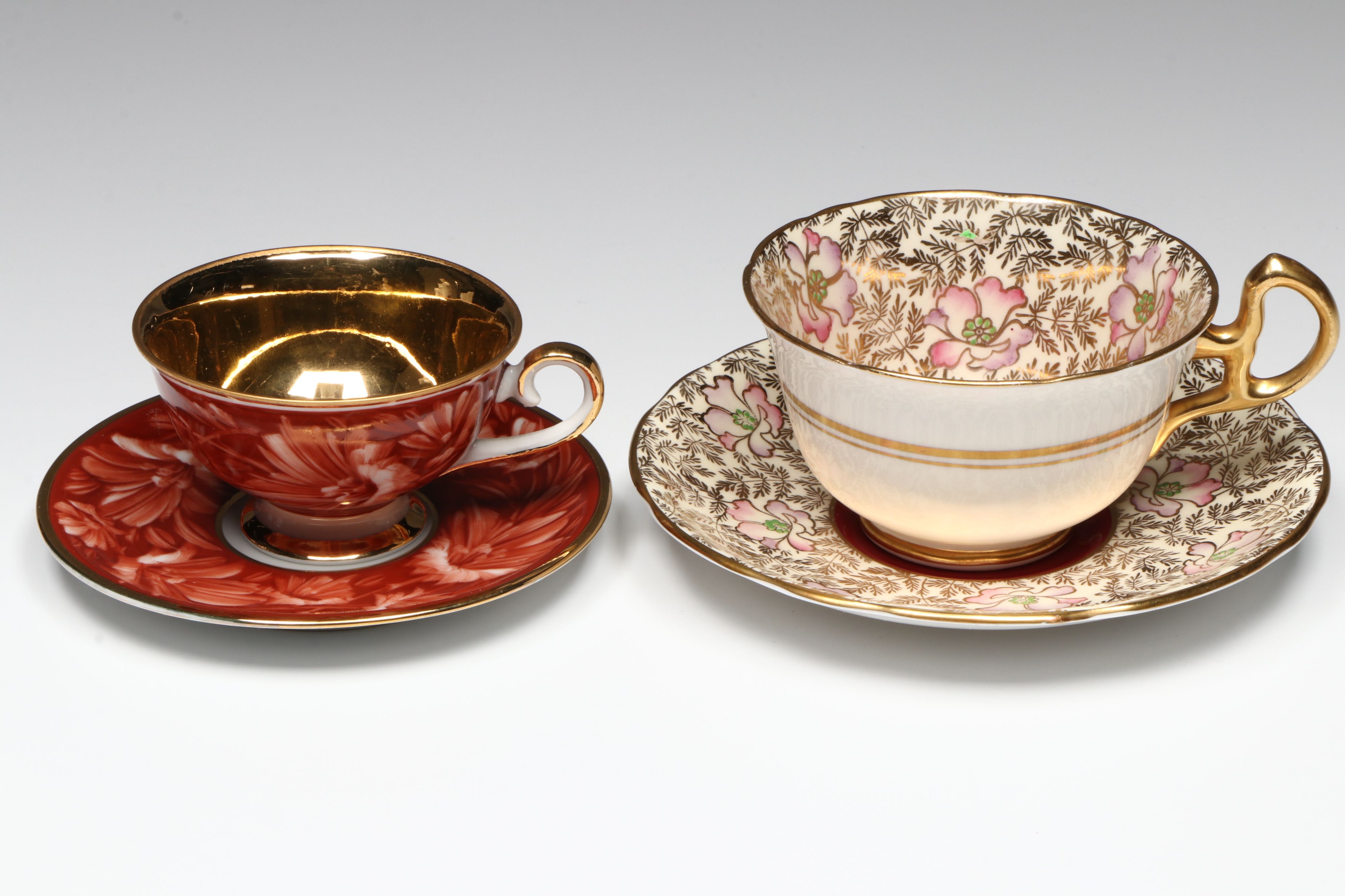 French Neoclassical Style Porcelain Figure with Other Bone China Teacups