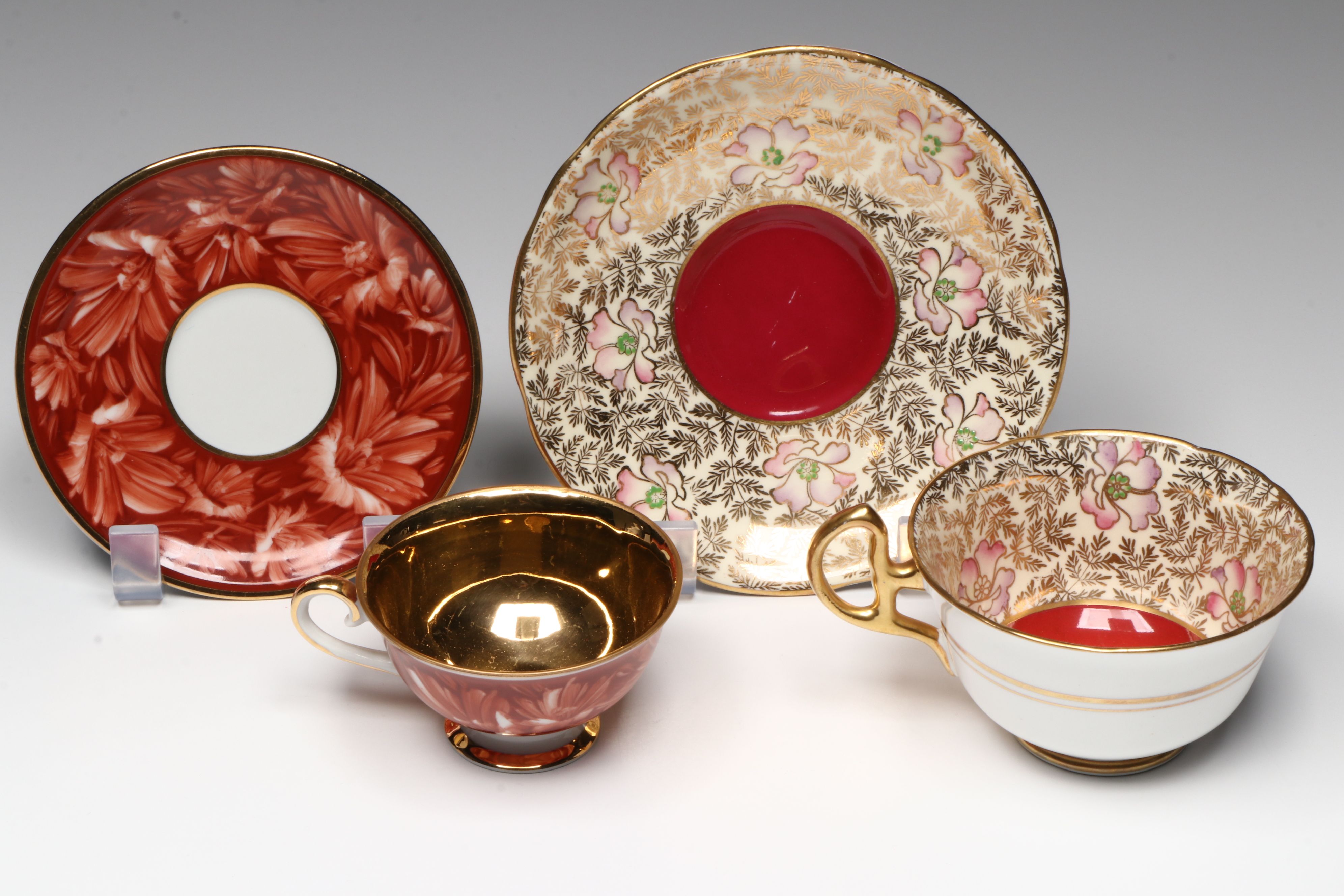 French Neoclassical Style Porcelain Figure with Other Bone China Teacups