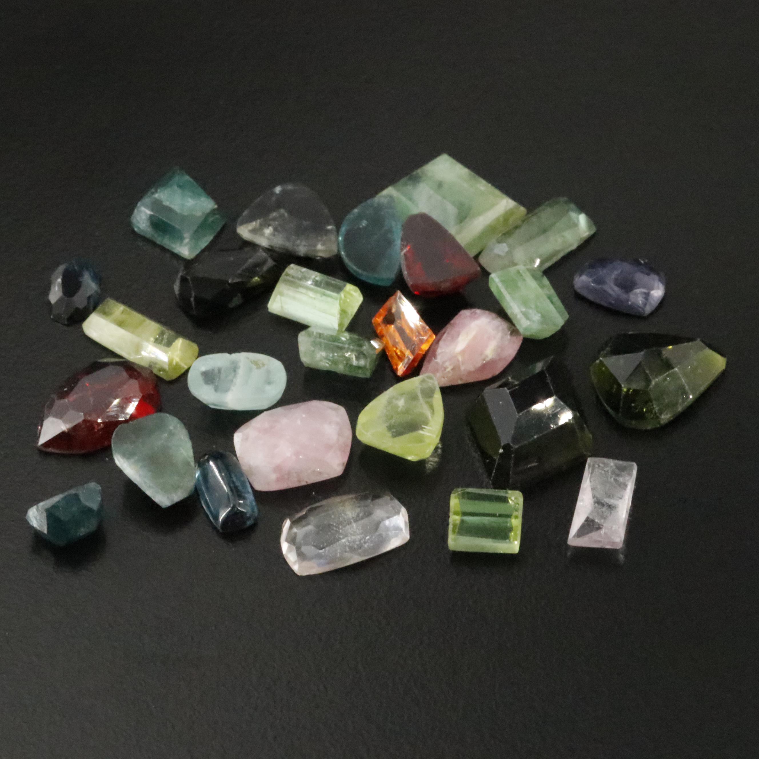 Loose 48.95 CTW Gemstone Lot Including Tourmaline, Garnet and Iolite