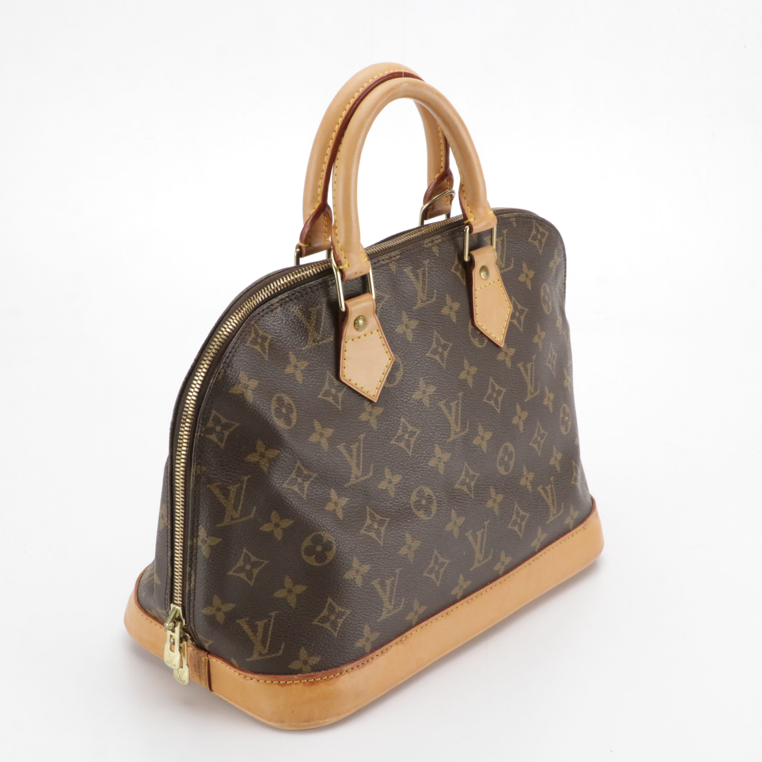 Louis Vuitton Alma PM Handbag in Monogram Canvas and Vachetta Leather
