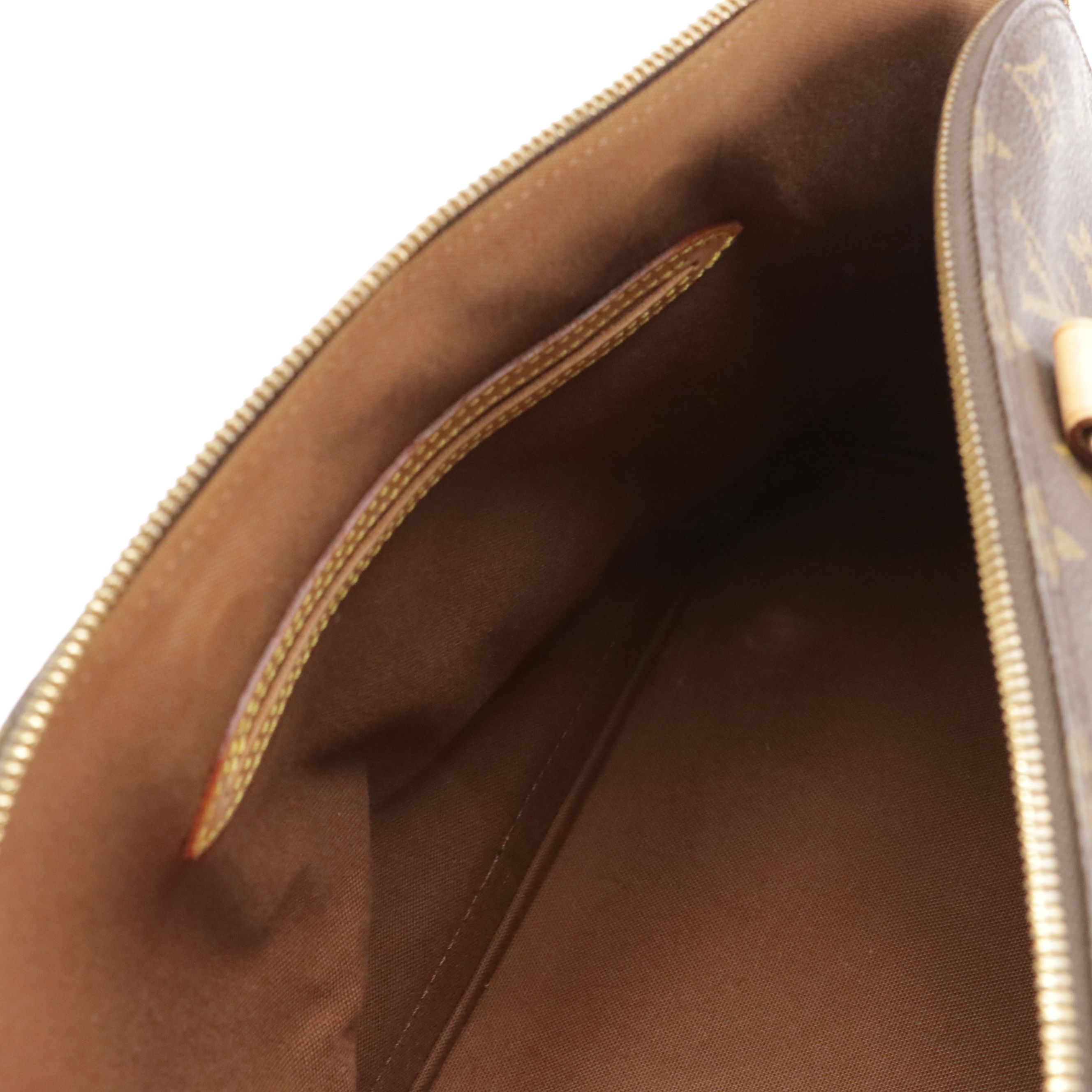 Louis Vuitton Alma PM Handbag in Monogram Canvas and Vachetta Leather