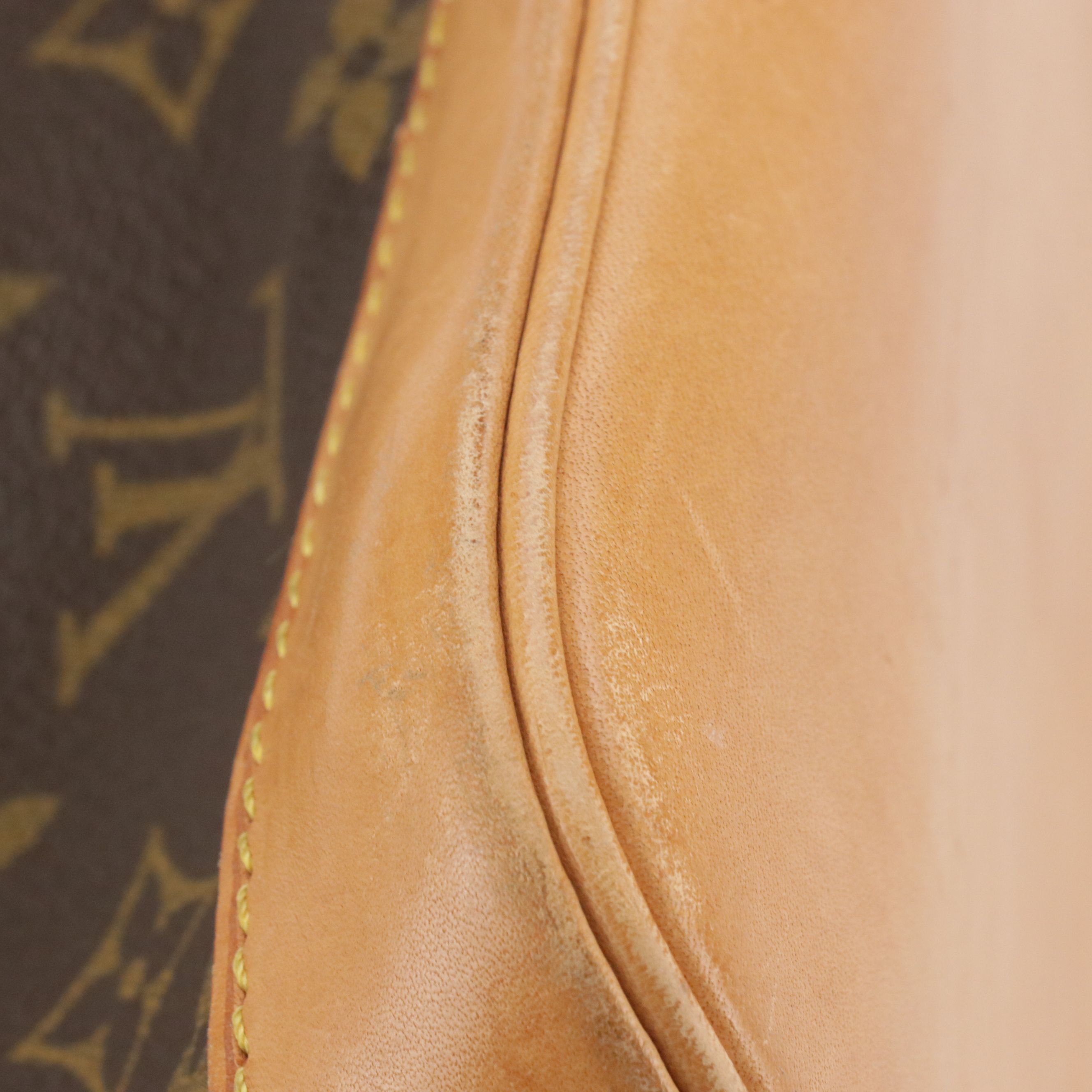 Louis Vuitton Alma PM Handbag in Monogram Canvas and Vachetta Leather