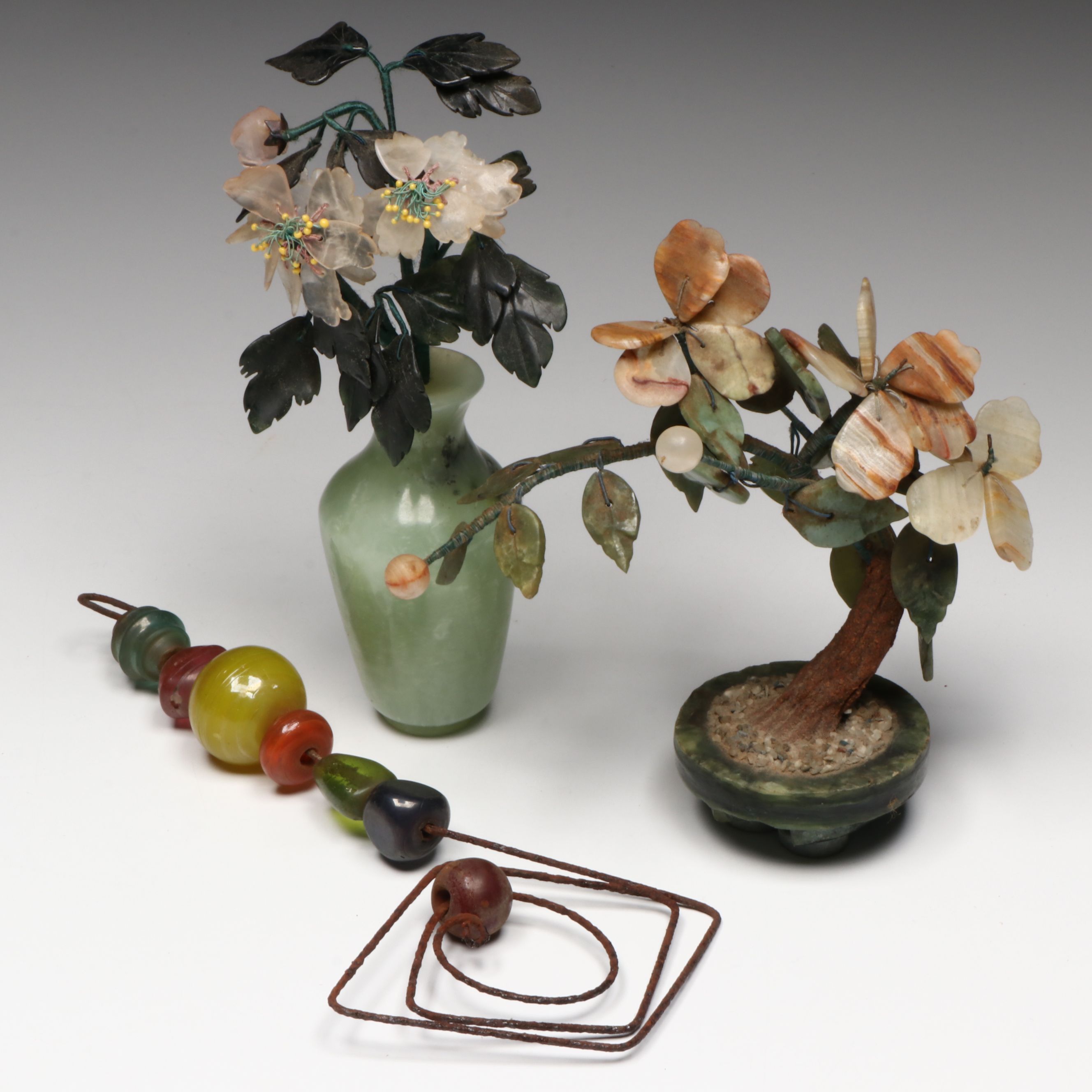 Carved Serpentine and Rose Quartz Flowers in Serpentine Vase with Other Décor