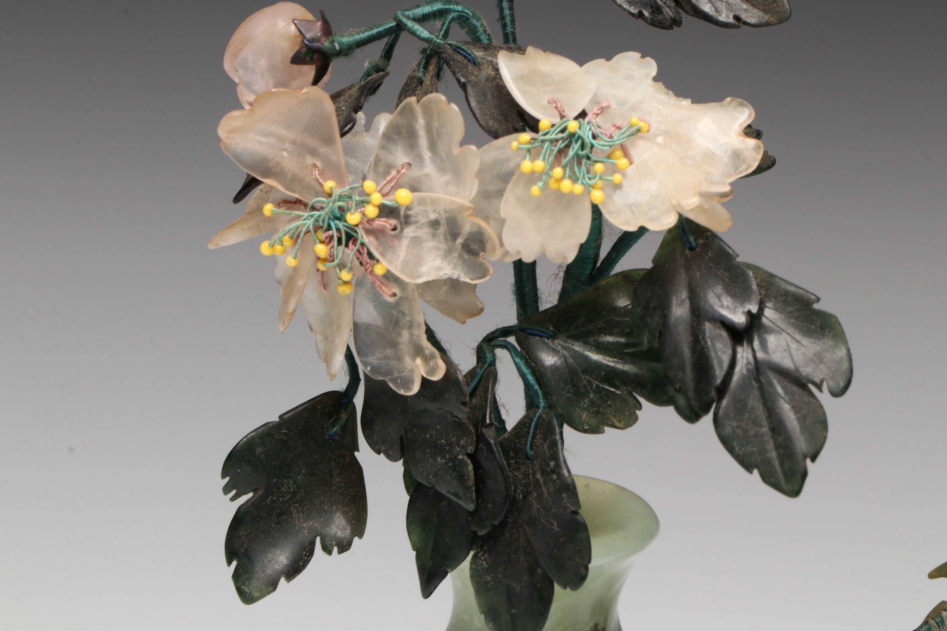 Carved Serpentine and Rose Quartz Flowers in Serpentine Vase with Other Décor